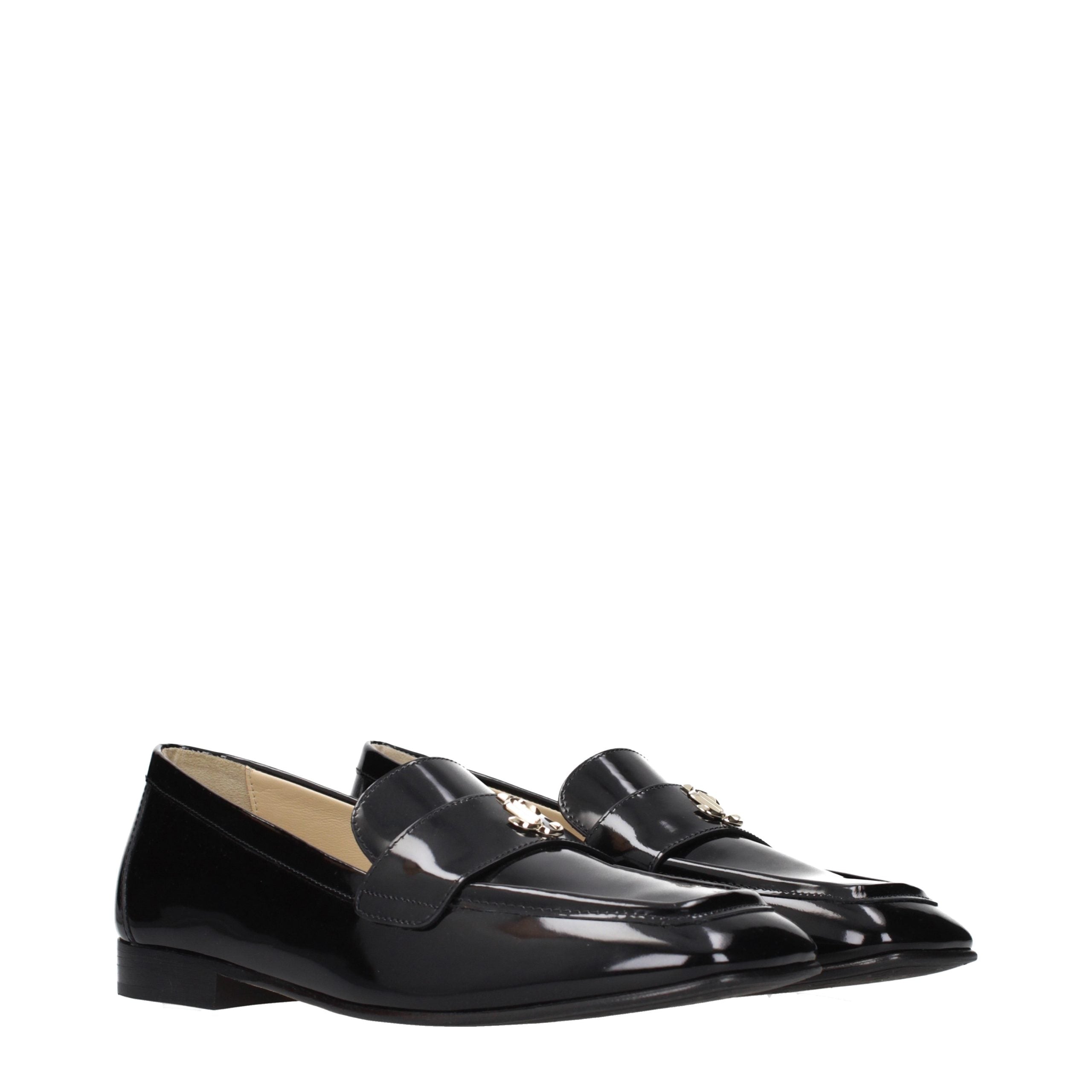Step into the realm of sophistication with Jimmy Choo Black Leather Slip-On Loafers, where exquisite craftsmanship meets timeless elegance, perfect for every occasion.