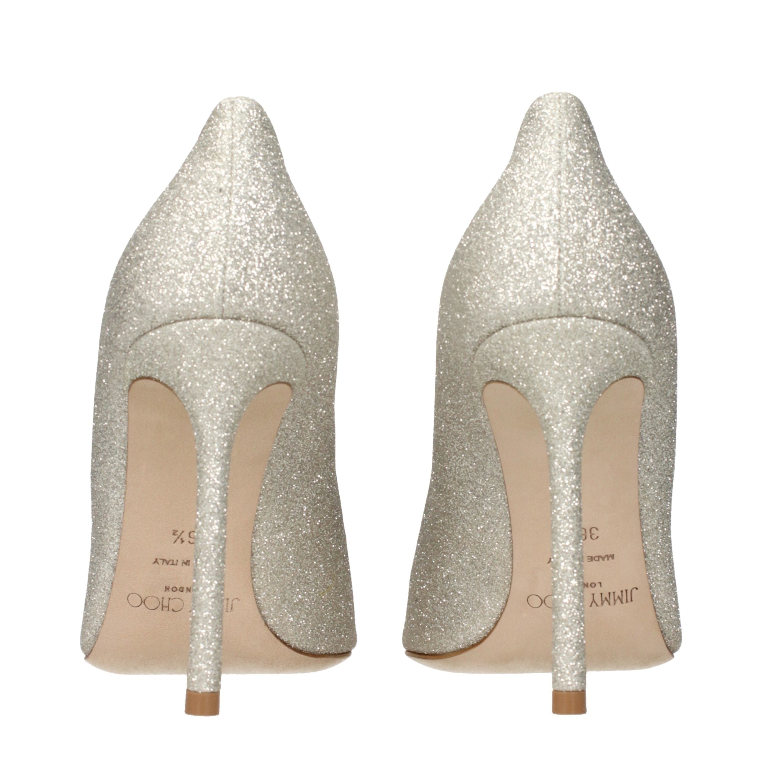 Step into opulence with Jimmy Choo Gold High Heel Pumps, where exquisite craftsmanship meets dazzling elegance, perfect for life's most luxurious moments.