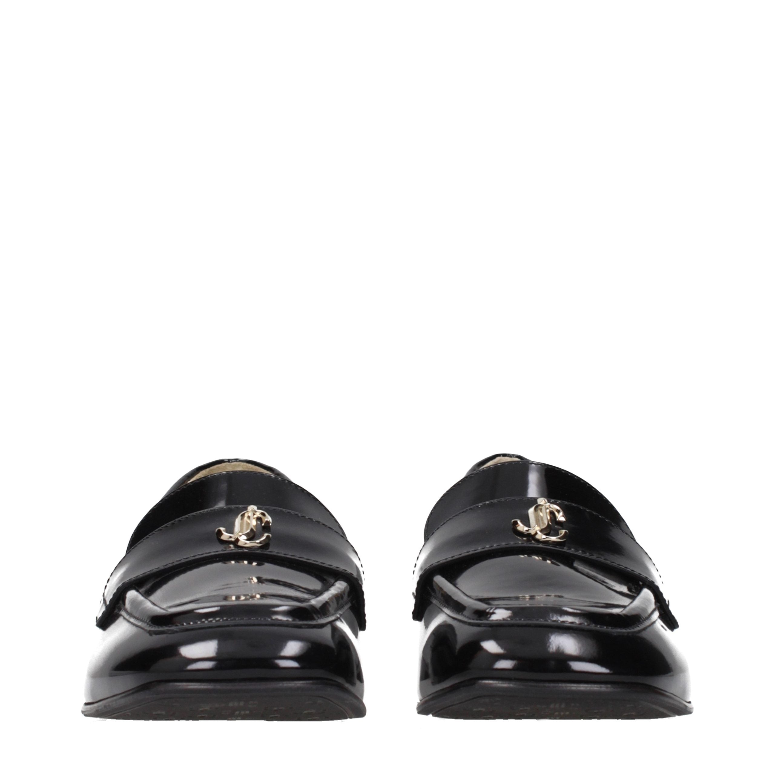 Indulge in the sophistication of Jimmy Choo Black Leather Slip-On Loafers, where exquisite craftsmanship meets timeless elegance, perfect for the discerning individual.