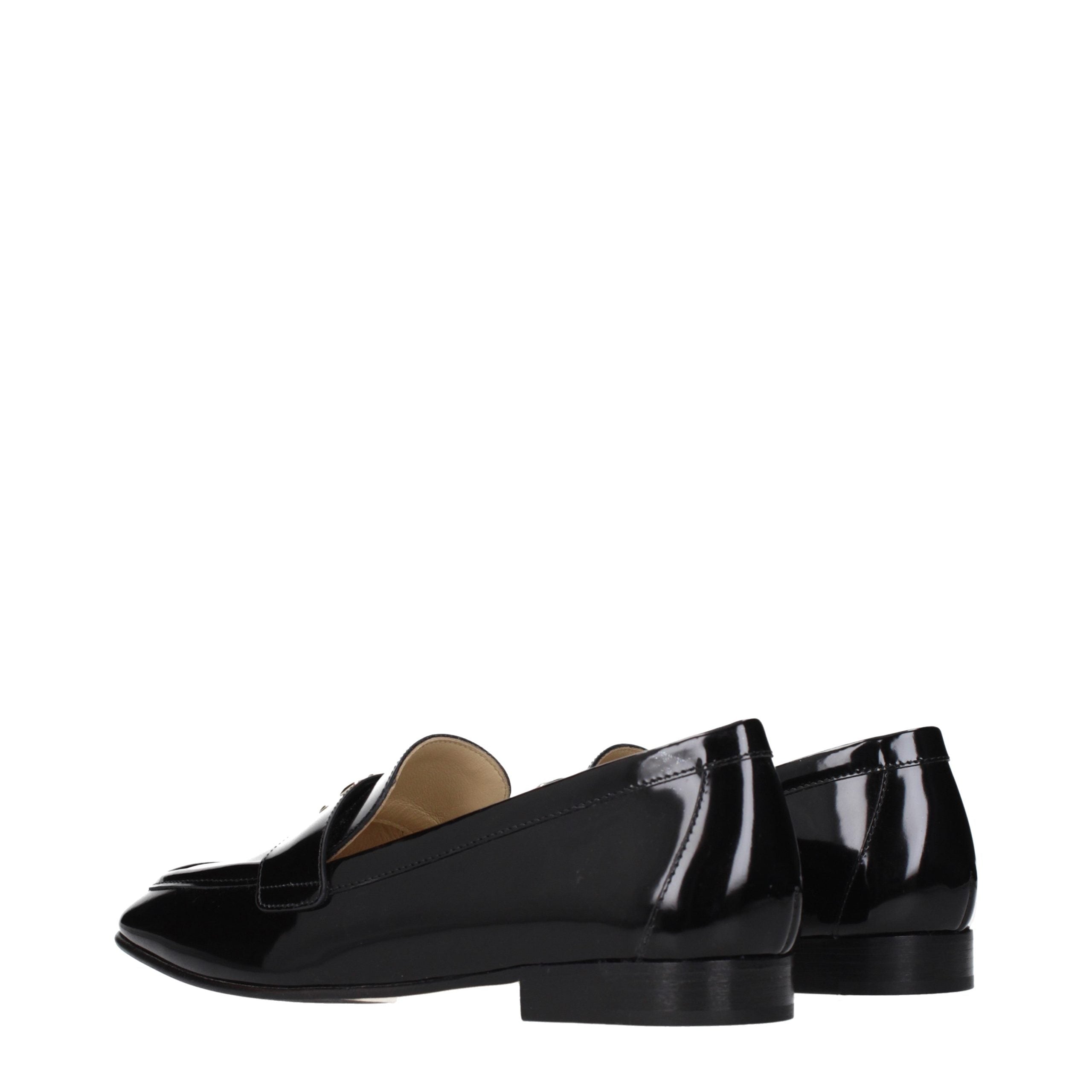 Elevate your style with Jimmy Choo Black Leather Slip-On Loafers, a masterpiece of luxury and sophistication, crafted for the discerning individual who embraces elegance.
