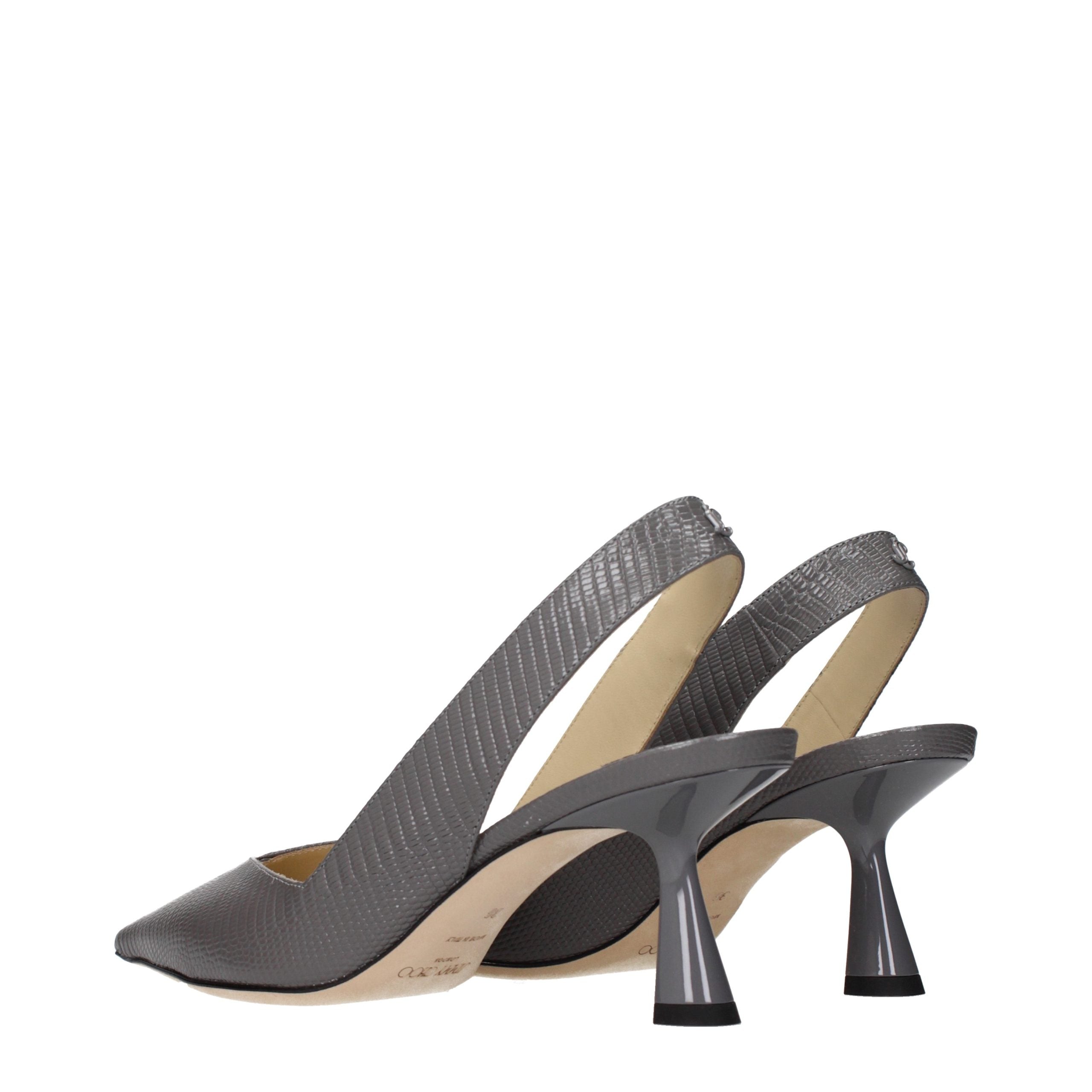 Experience the allure of Jimmy Choo Gray Leather High Heel Pumps, where exquisite craftsmanship meets timeless elegance, elevating your style with luxurious sophistication.