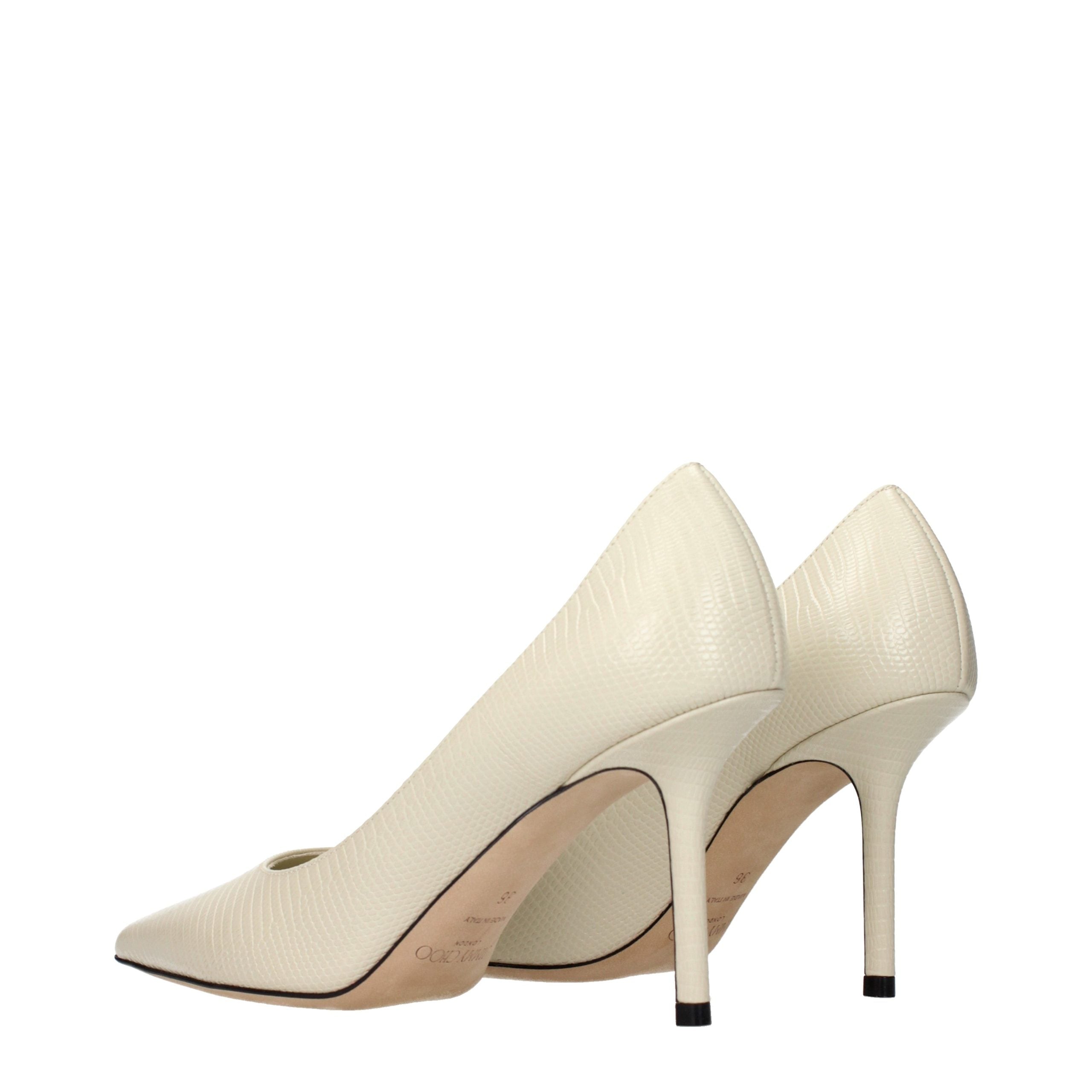 Indulge in the exquisite allure of Jimmy Choo's Beige Leather High Heel Pumps, where timeless elegance meets unparalleled craftsmanship for the discerning connoisseur.