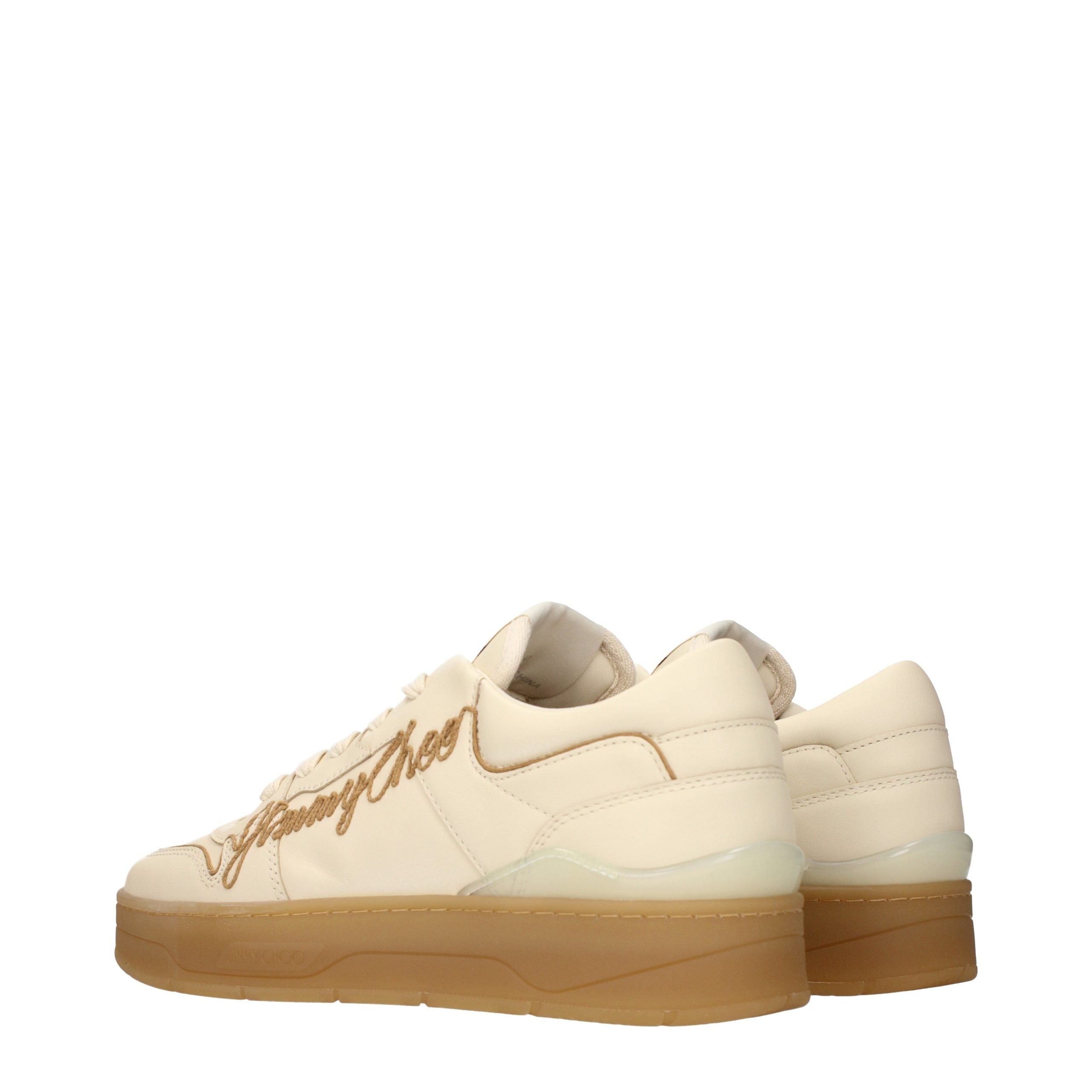 Elevate your style with Jimmy Choo's Beige Leather Low Top Sneakers, where exquisite craftsmanship meets timeless elegance, perfect for the discerning connoisseur.