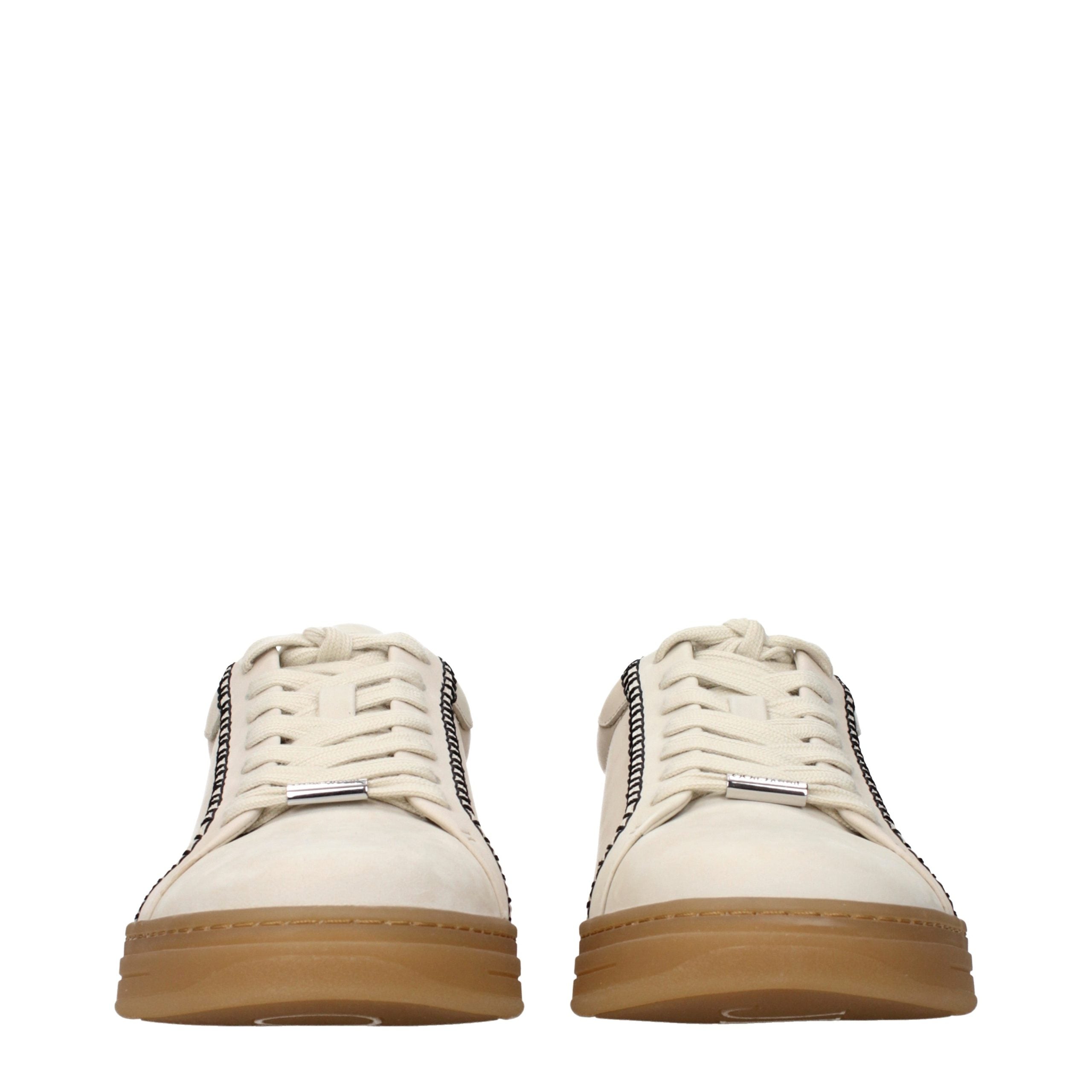 Experience the allure of Jimmy Choo Beige Leather Sneakers, where exquisite suede meets unparalleled craftsmanship, embodying luxury for the discerning individual.