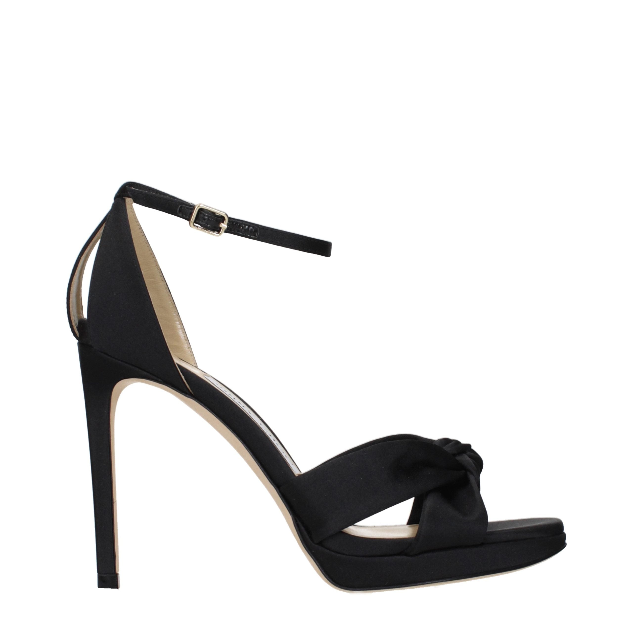 Step into elegance with Jimmy Choo Black Satin Platform Sandals, where exquisite craftsmanship meets luxurious design, perfect for the discerning fashion connoisseur.