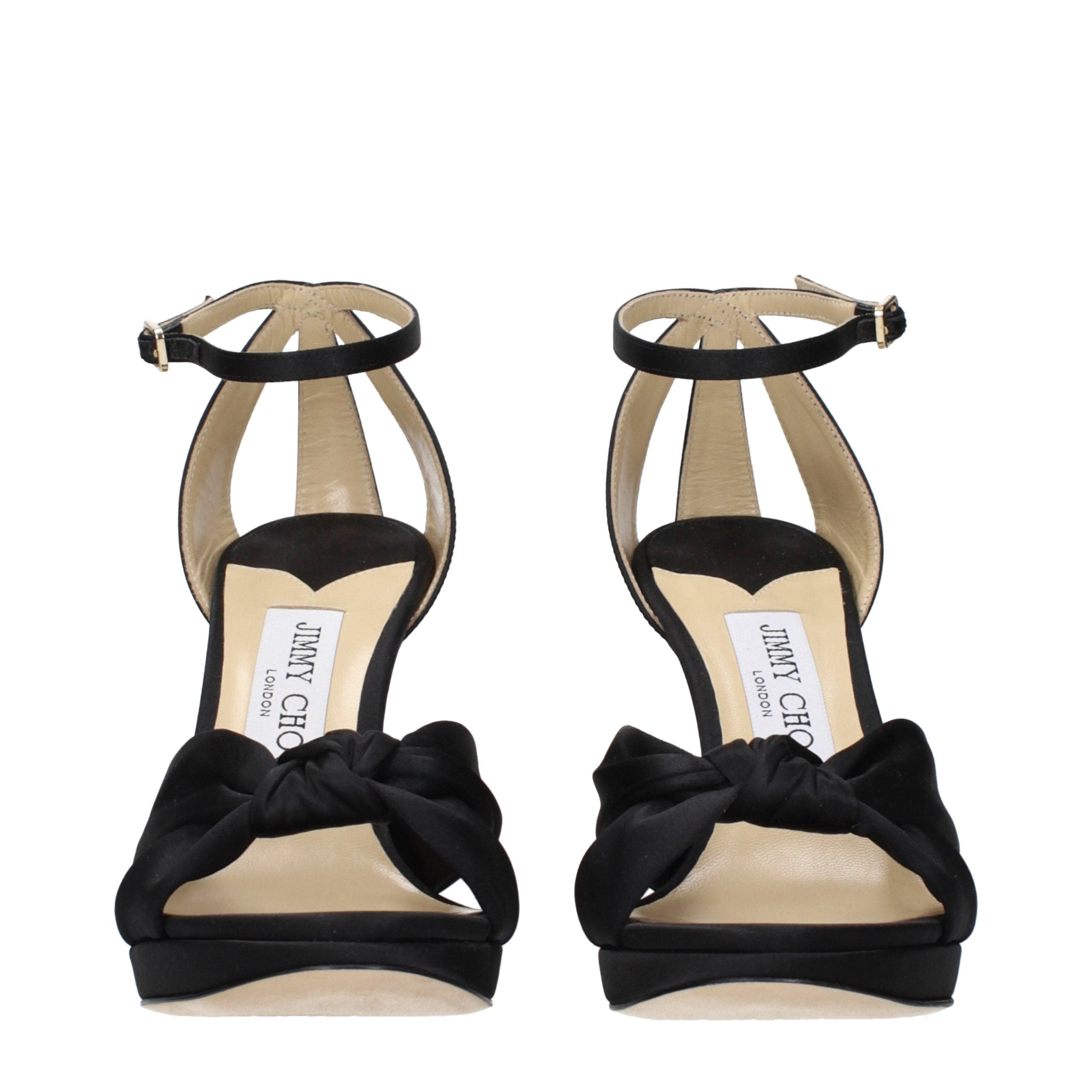 Elevate your style with Jimmy Choo Black Satin Platform Sandals, a masterpiece of luxury and craftsmanship, perfect for unforgettable evenings and sophisticated gatherings.