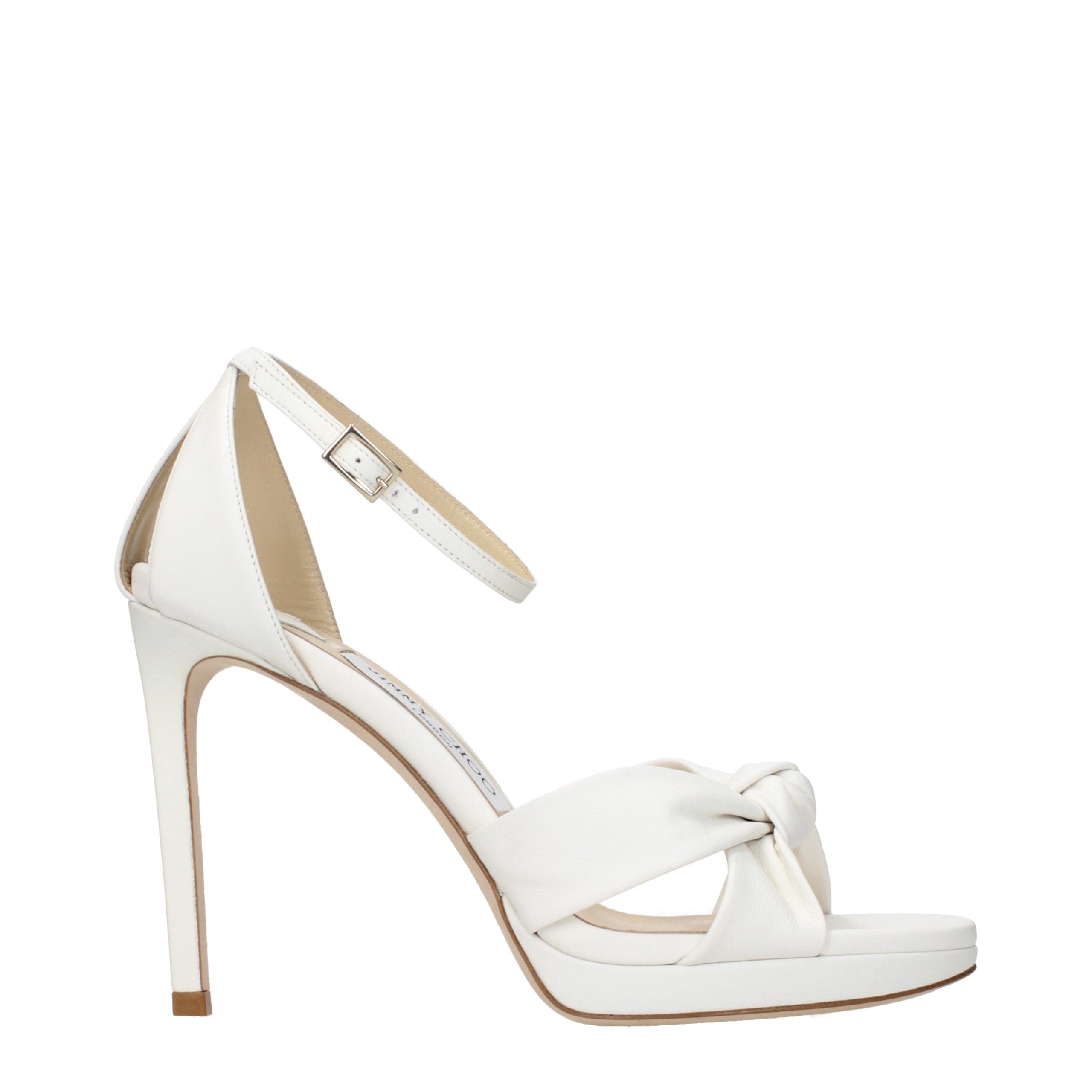 Elevate your style with Jimmy Choo White Leather Platform Sandals, where exquisite craftsmanship meets timeless elegance, perfect for the discerning fashionista.