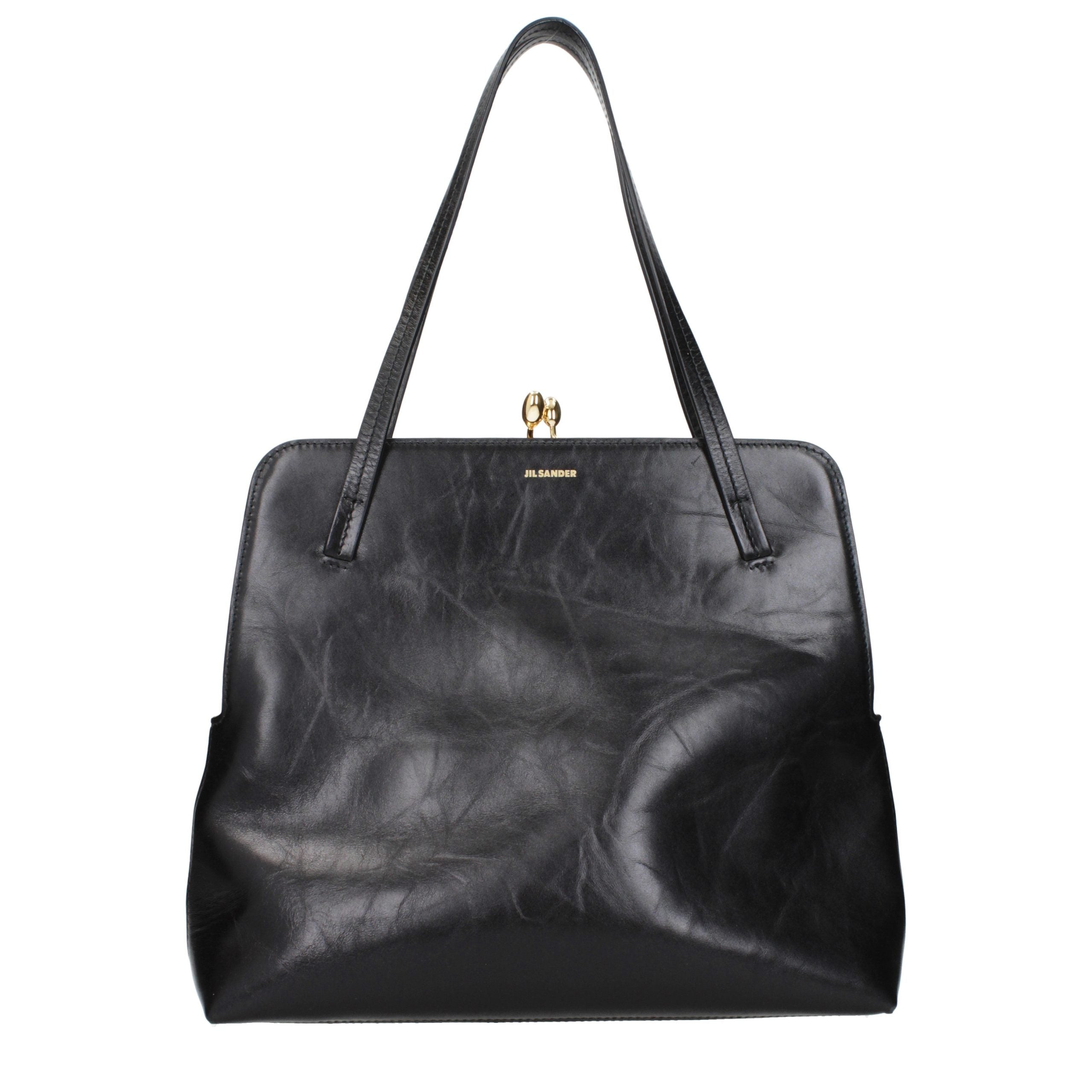 Indulge in the Jil Sander Black Leather Shoulder Bag, a timeless luxury accessory that embodies exquisite craftsmanship and sophisticated elegance for the discerning individual.