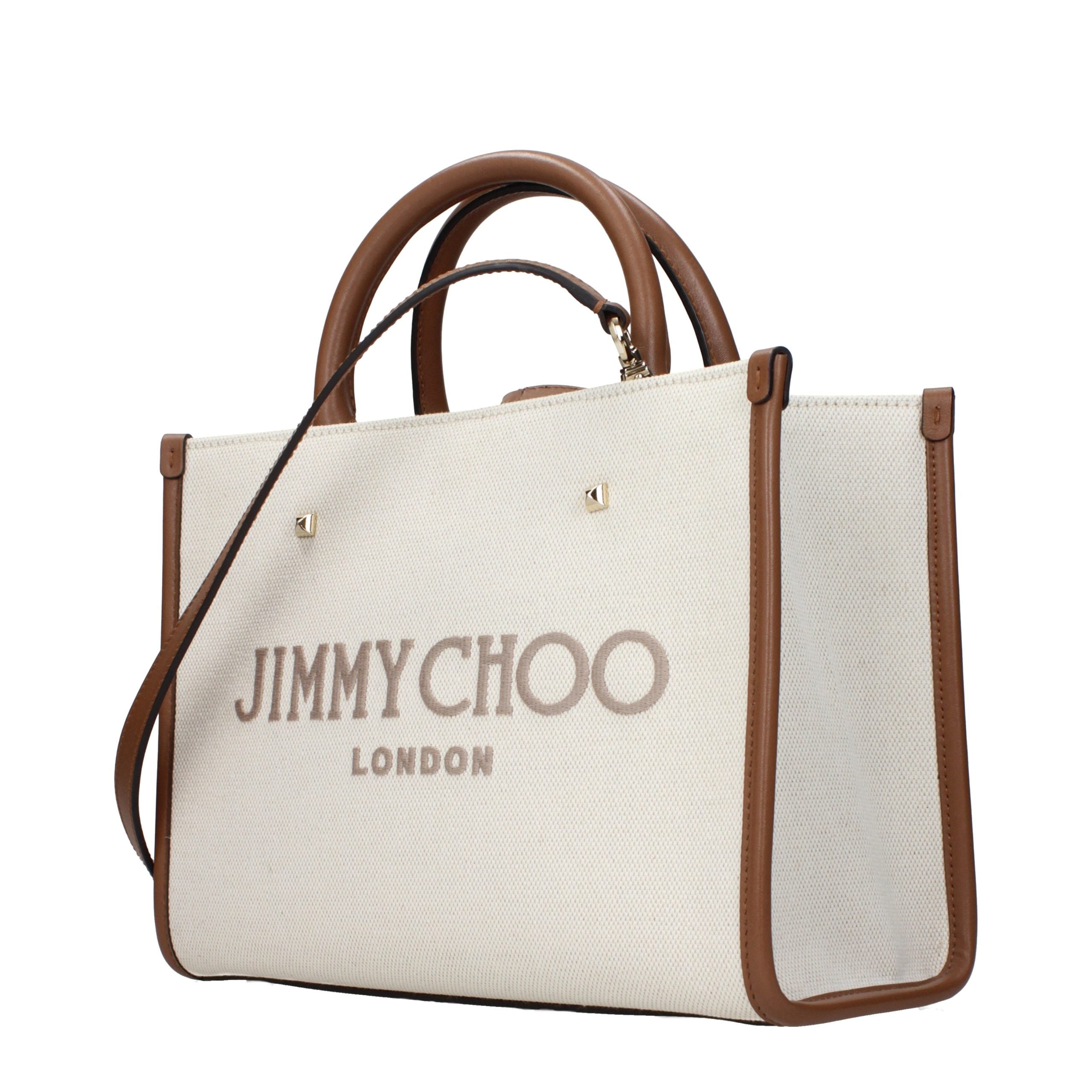 Indulge in the exquisite Jimmy Choo Beige Fabric Handbag, a timeless masterpiece that embodies luxury and sophistication, perfect for the discerning individual.