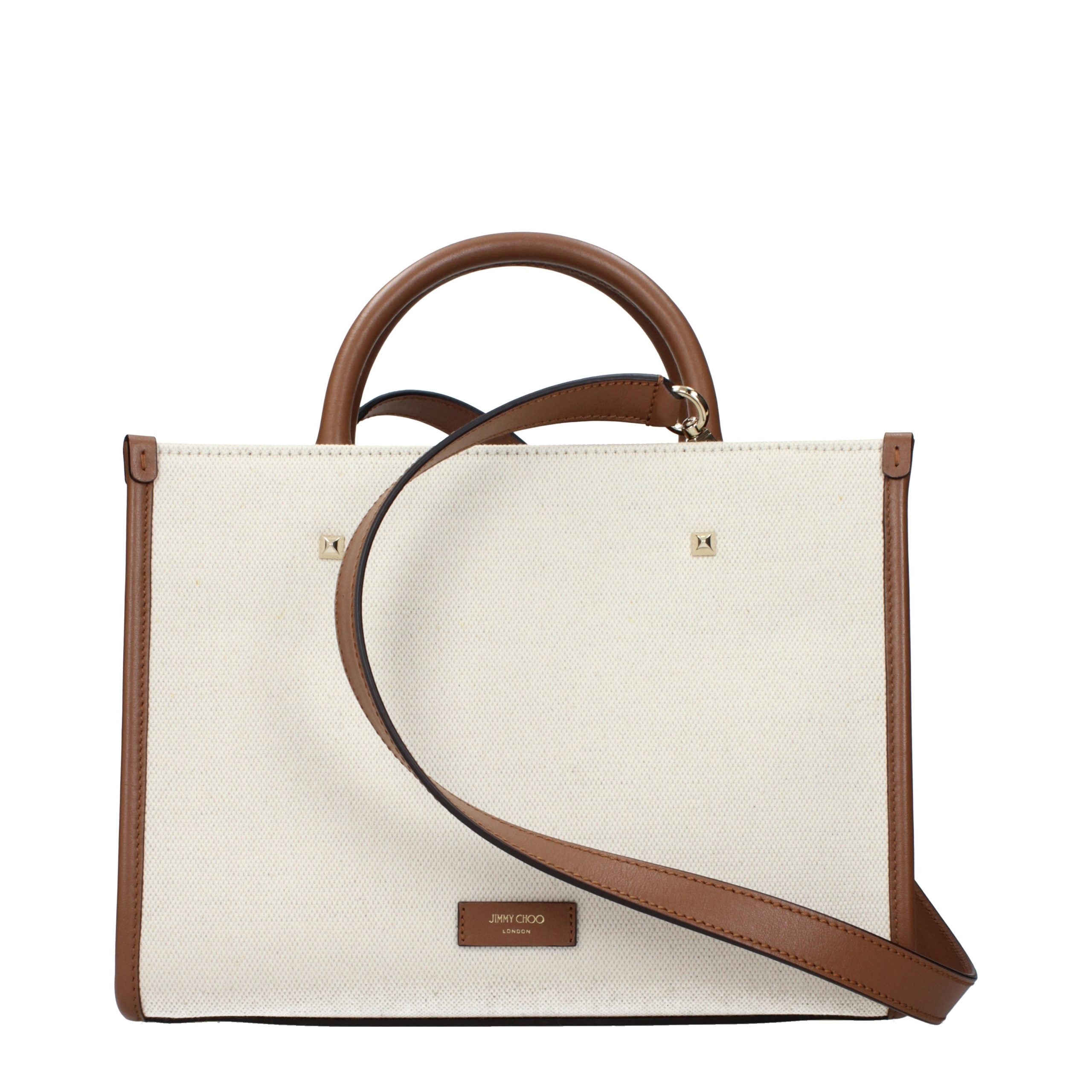 Indulge in the exquisite Jimmy Choo Beige Fabric Handbag, a timeless masterpiece that embodies luxury and sophistication, perfect for the discerning connoisseur.