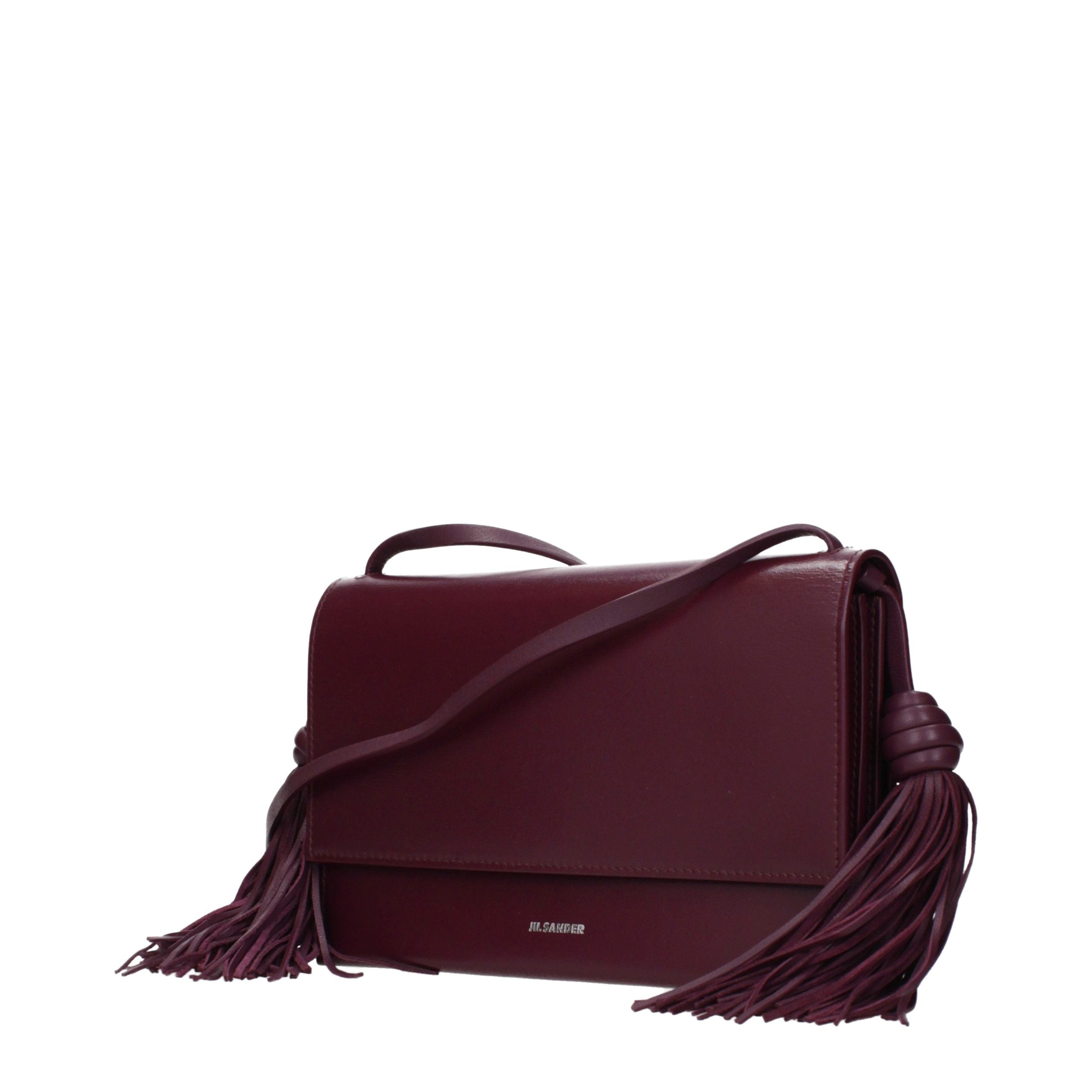Experience the exquisite allure of the Jil Sander Red Leather Crossbody Bag, where luxurious craftsmanship meets timeless elegance, elevating your sophisticated style.
