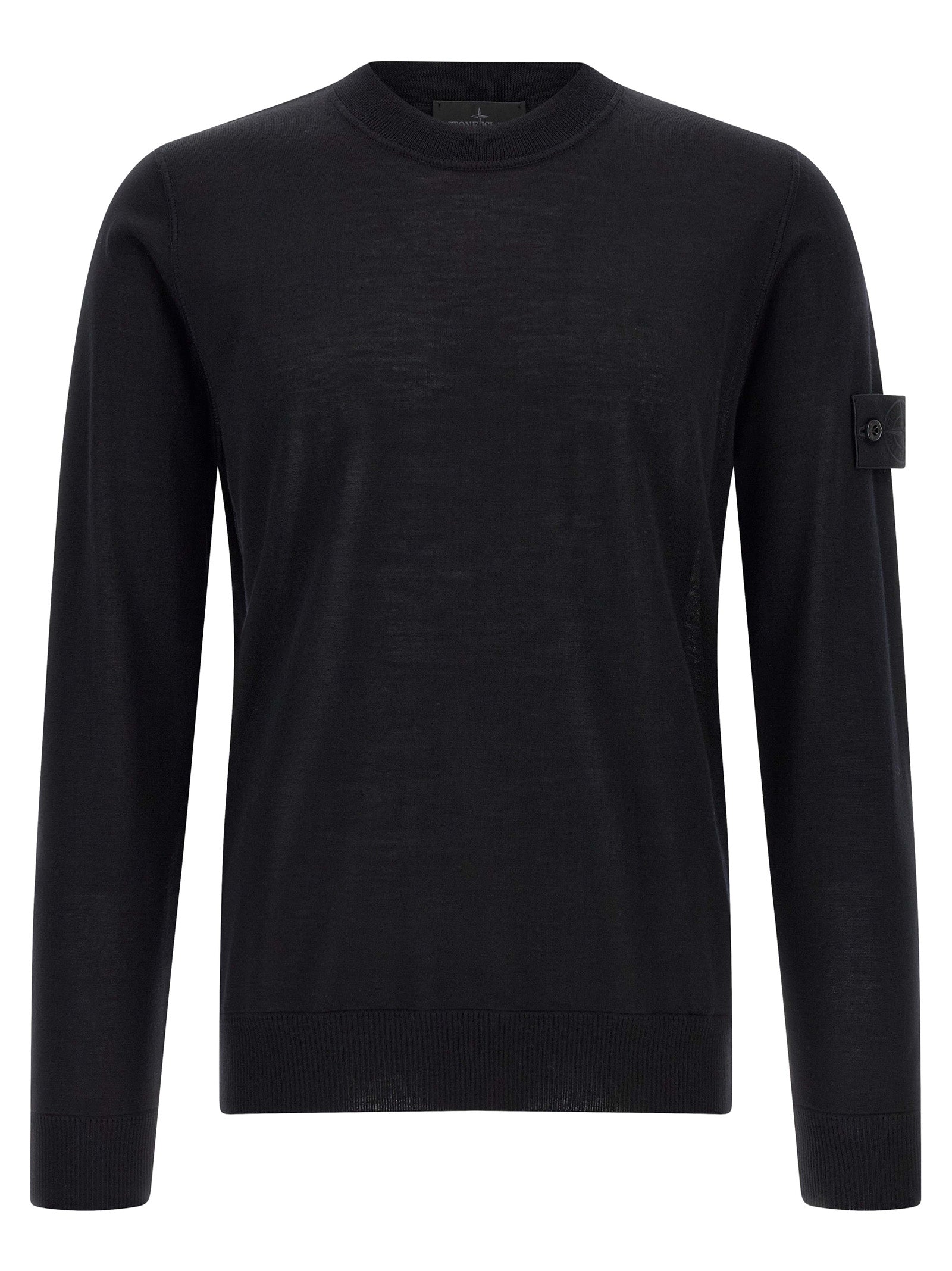 Elevate your wardrobe with the Stone Island Black Virgin Wool Cardigan, a masterpiece of luxurious craftsmanship and timeless elegance, perfect for any occasion.