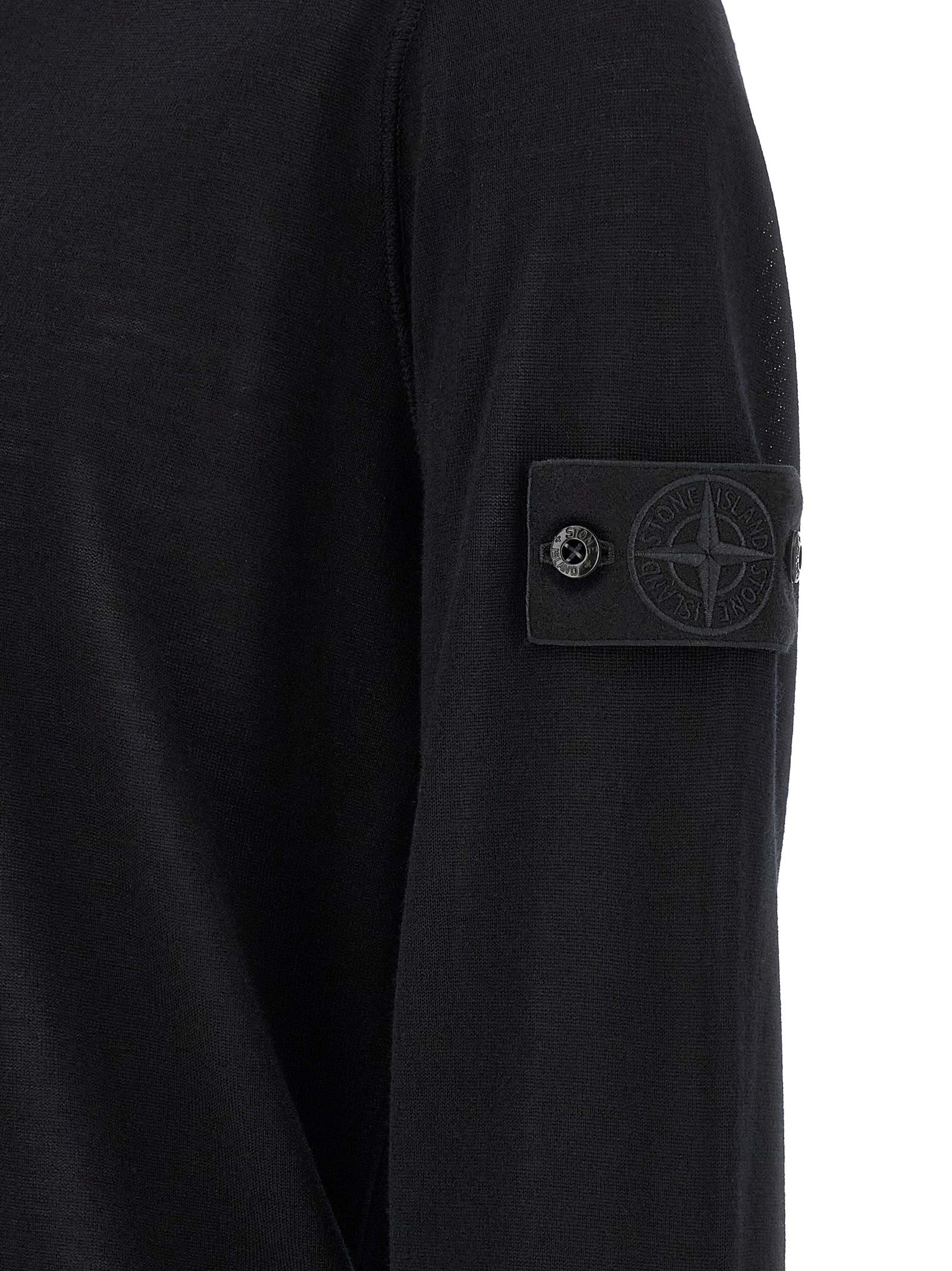 Indulge in the Stone Island Black Virgin Wool Cardigan, where exquisite craftsmanship meets timeless elegance, perfect for those who embody sophistication and style.