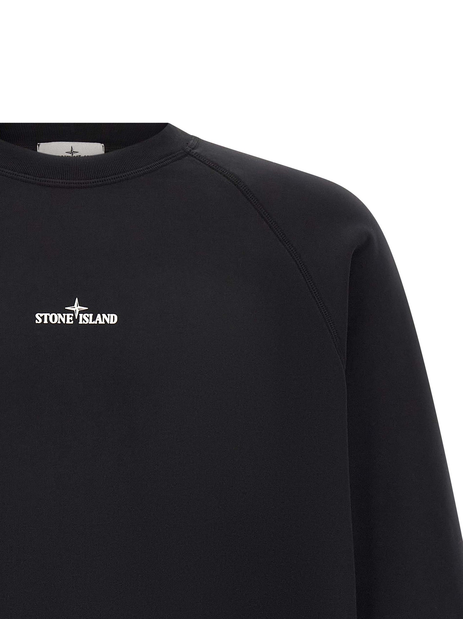 Indulge in the Stone Island Black Cotton Sweatshirt, a masterpiece of 100% cotton elegance, where timeless design meets contemporary allure for the discerning individual.
