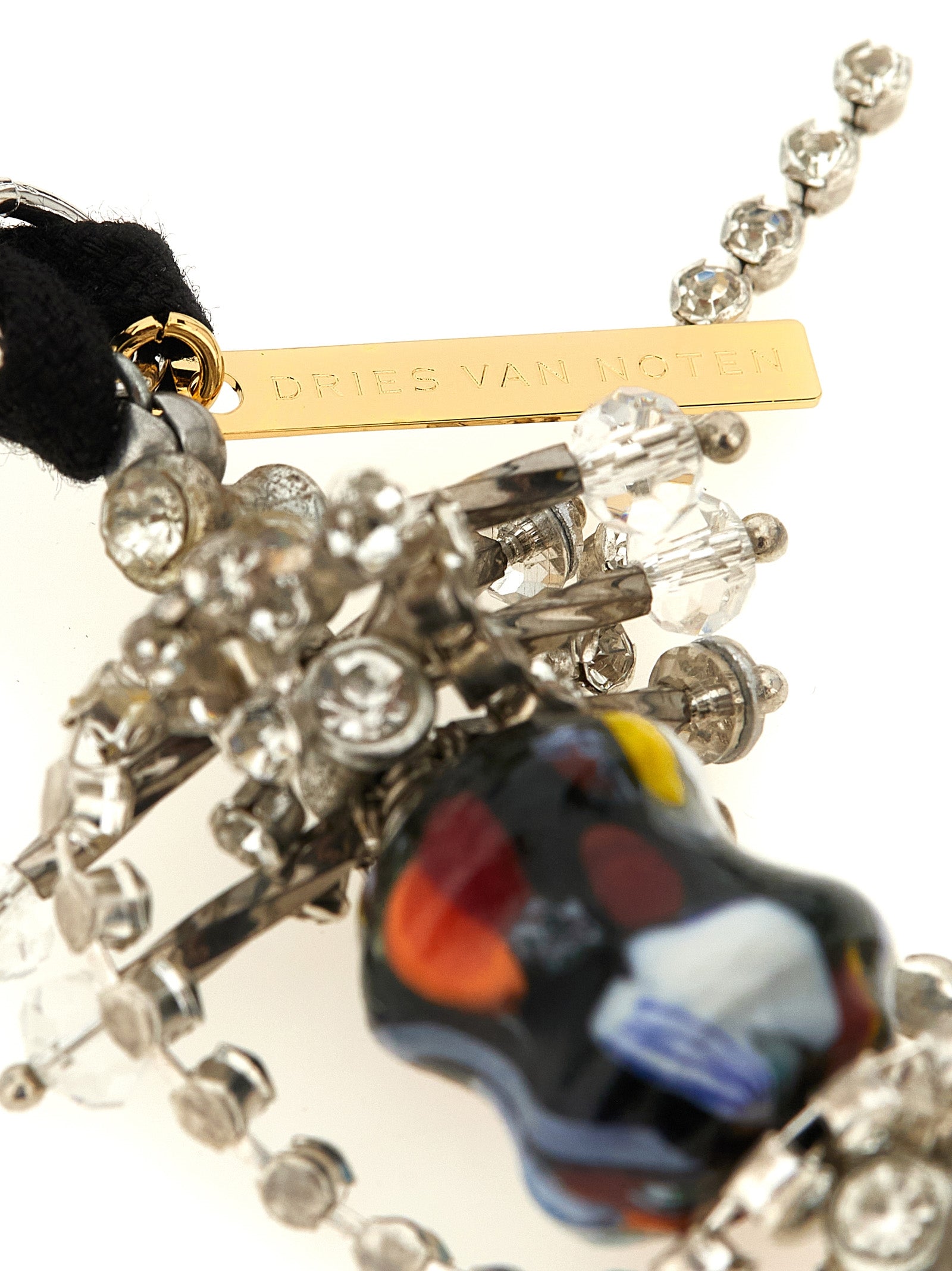 Elevate your style with the Dries Van Noten Black Glass Necklace, a sculptural masterpiece of polychrome glass and crystal fringes, embodying luxury and sophistication.