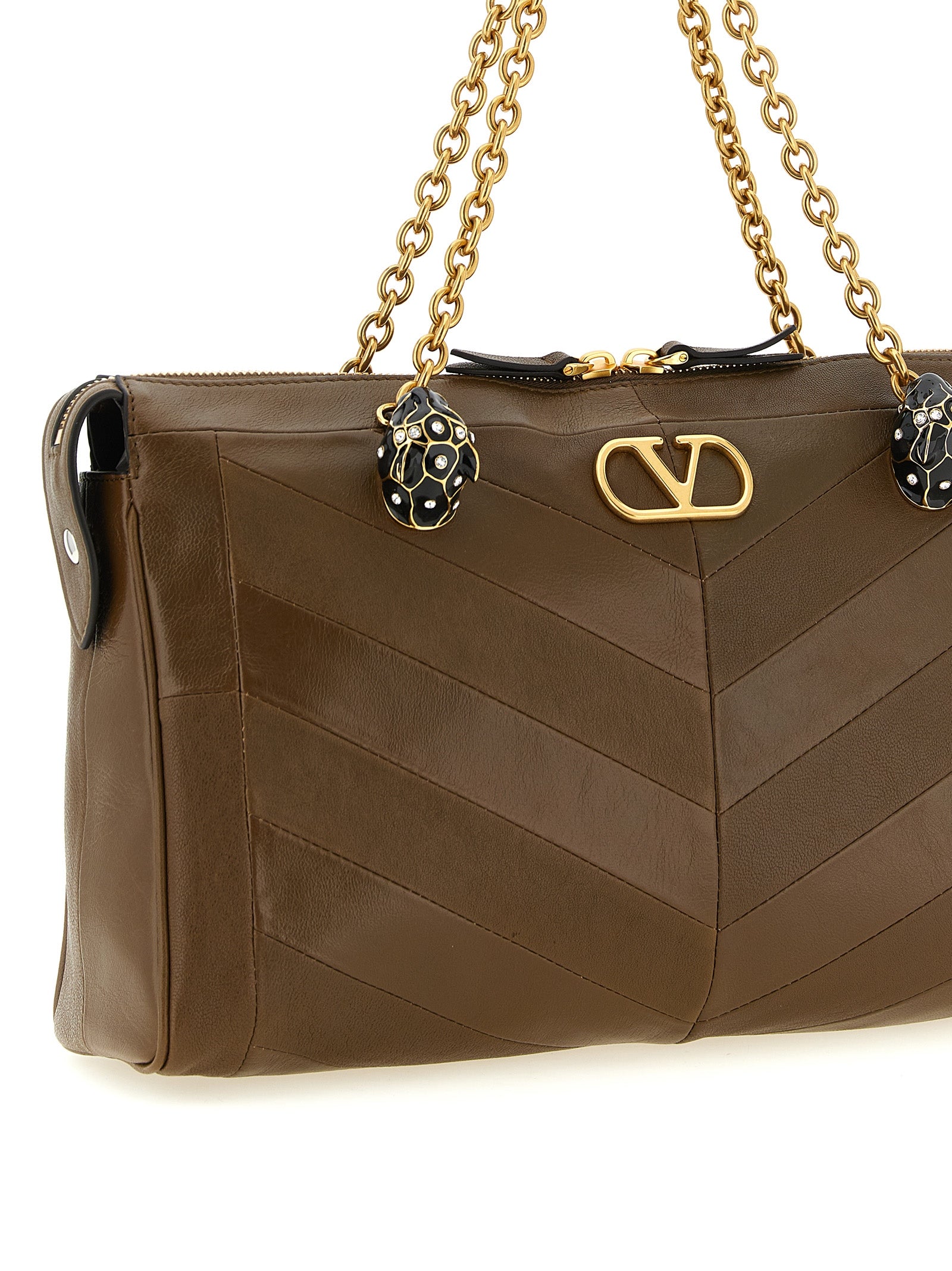 Discover the Valentino Garavani Brown Lamb Leather Shoulder Bag, a masterpiece of Italian craftsmanship that embodies timeless elegance and sophisticated allure.