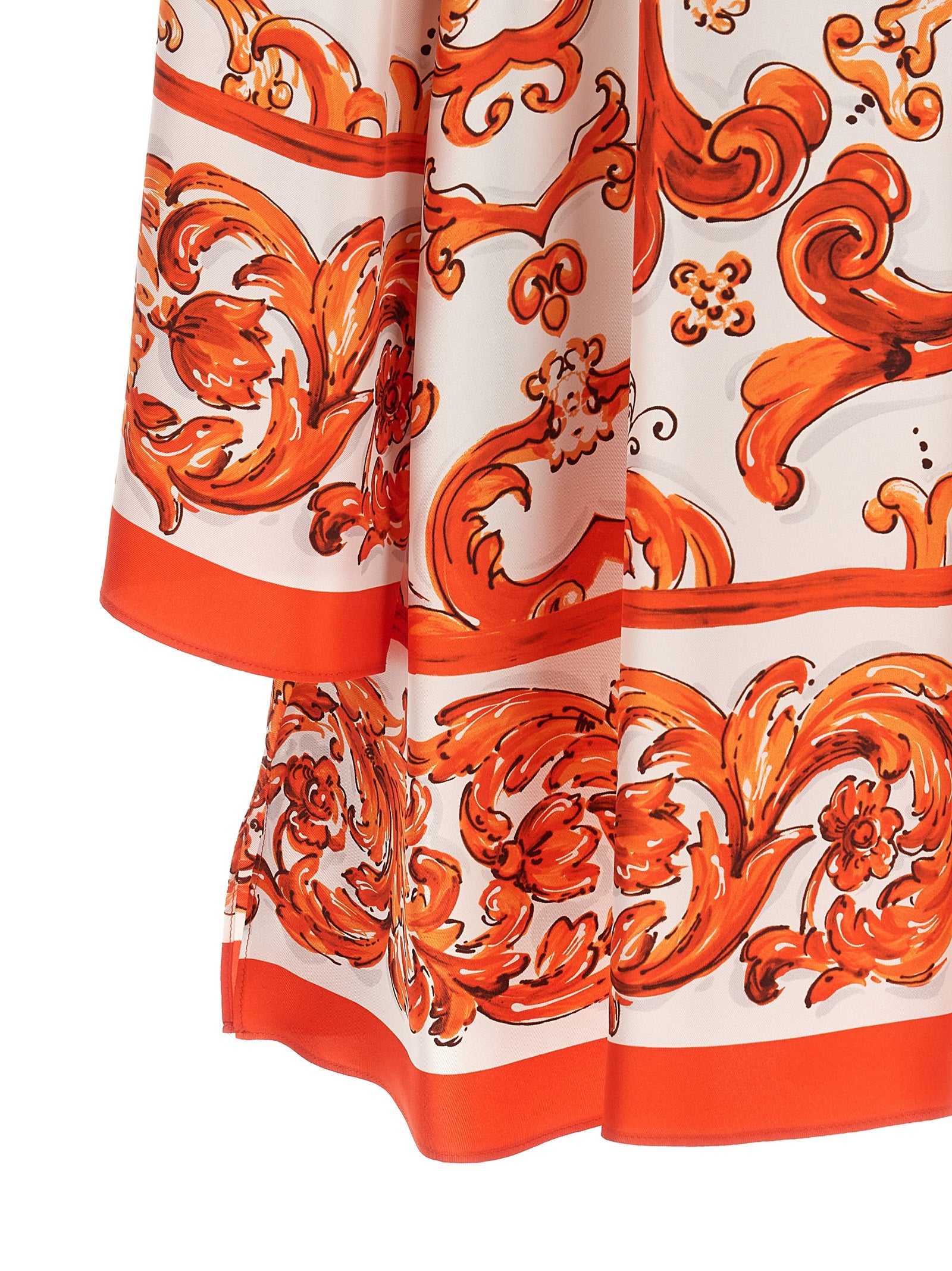 Discover the Dolce & Gabbana Orange Silk Short Dress, a stunning embodiment of elegance and artistry, crafted from pure silk twill for the discerning connoisseur.