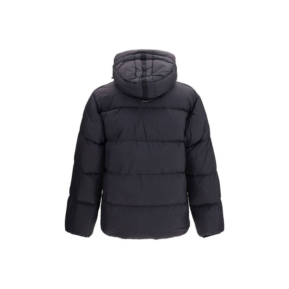 Indulge in the Parajumpers Black Goose Down Full-Length Jacket, where exquisite craftsmanship meets unparalleled warmth, redefining winter elegance for the discerning individual.