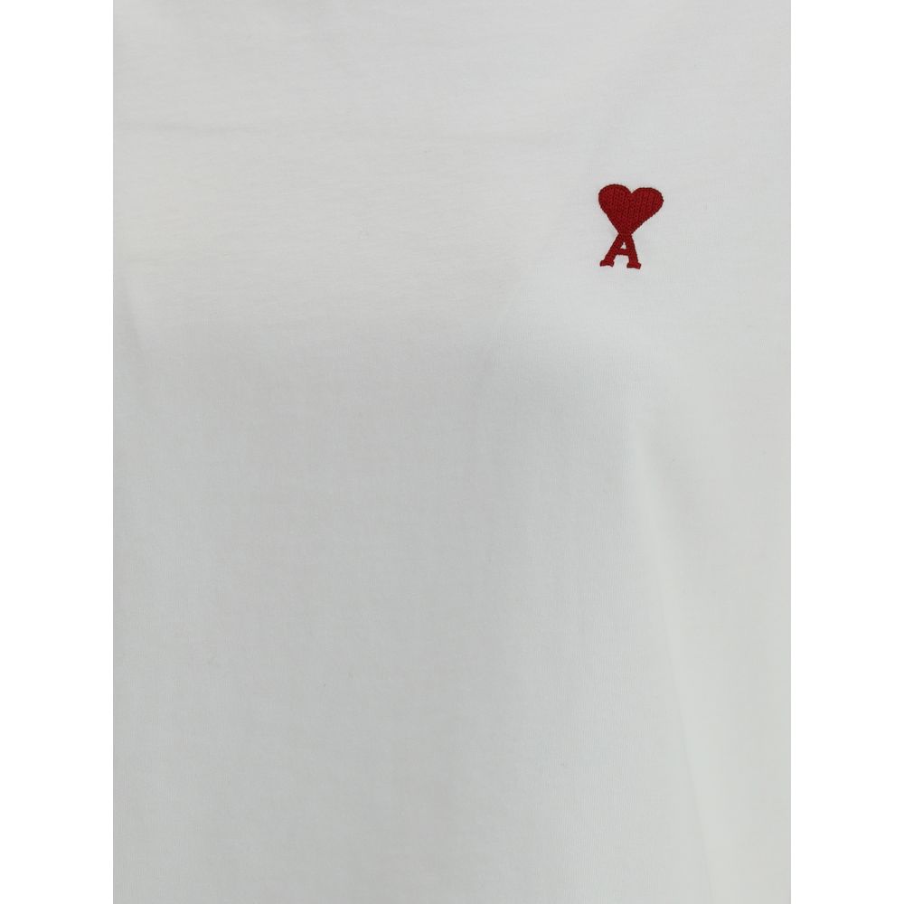 Discover the Ami Paris White Cotton T-Shirt, a masterpiece of 100% cotton craftsmanship, embodying elevated casual elegance for the discerning individual.