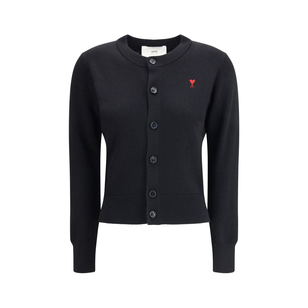 Indulge in the Ami Paris Black Merino Wool Cardigan, a masterpiece of luxury crafted from 100% merino wool, embodying sophistication and timeless elegance for every occasion.