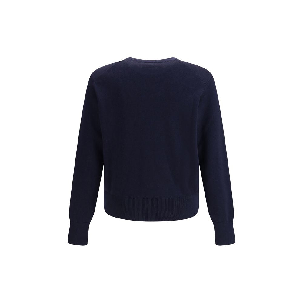 Discover the Ami Paris Blue Cotton Sweatshirt, a blend of modern design and luxurious comfort, perfect for the discerning individual seeking timeless elegance.