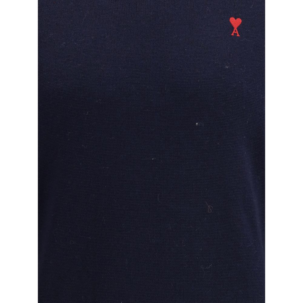 Indulge in the timeless elegance of the Ami Paris Blue Cotton Sweatshirt, a masterpiece of modern design and luxurious comfort, perfect for elevating your style.