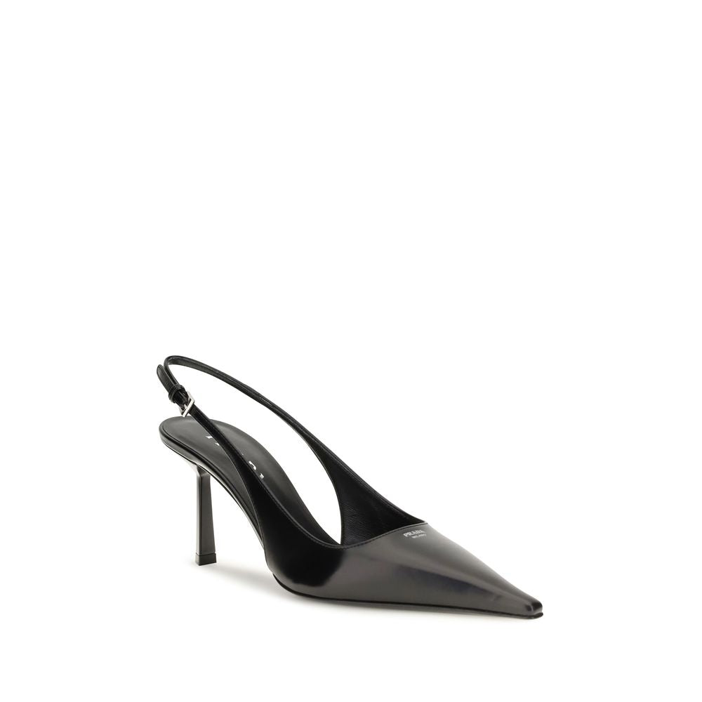 Indulge in the exquisite Prada Black Calf Leather Bos Taurus High Heel Pumps, where timeless elegance meets unparalleled craftsmanship, elevating your every step.