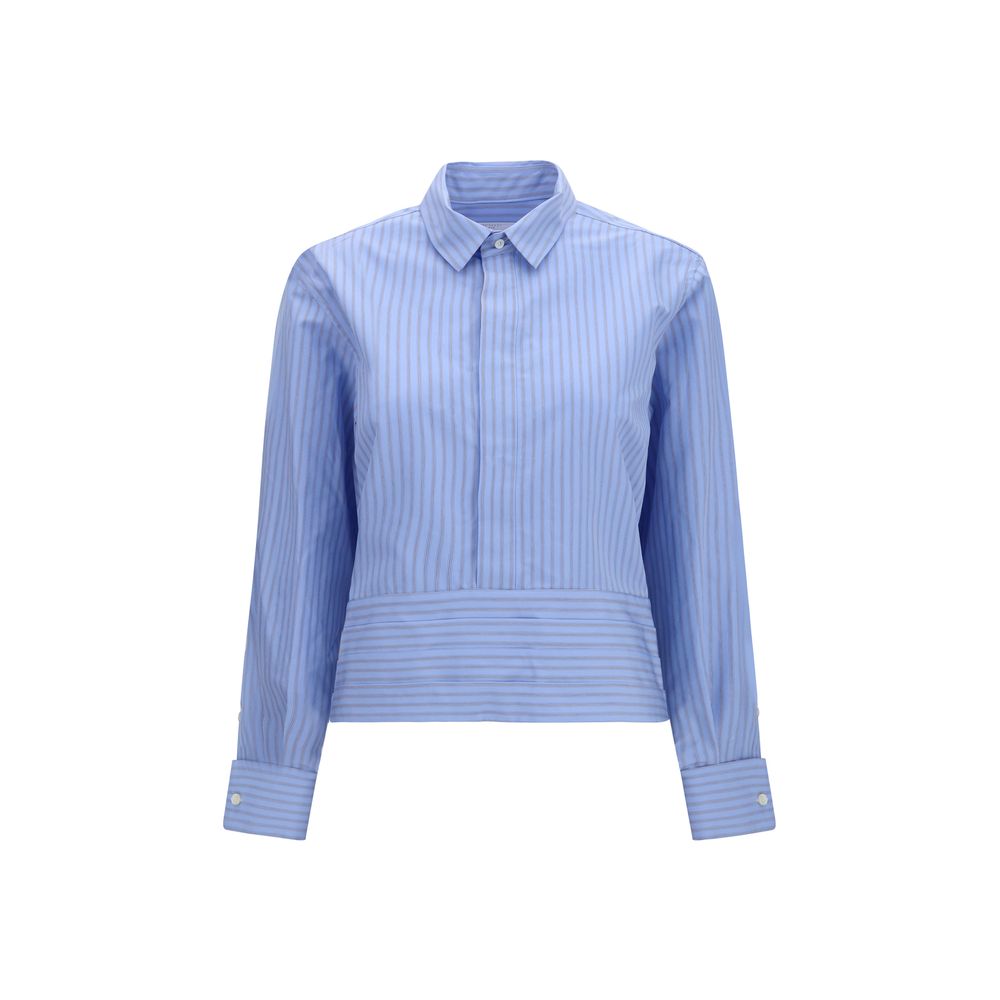 Elevate your style with the Sacai Blue Cotton Pattern Shirt from the AW26 collection, a luxurious blend of cotton and polyester, embodying sophistication and modern artistry.