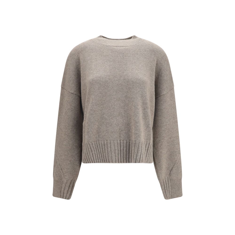 Indulge in the Malo Beige Cashmere Sweater, a timeless piece crafted from 100% cashmere, embodying Italian elegance and luxurious comfort for every occasion.