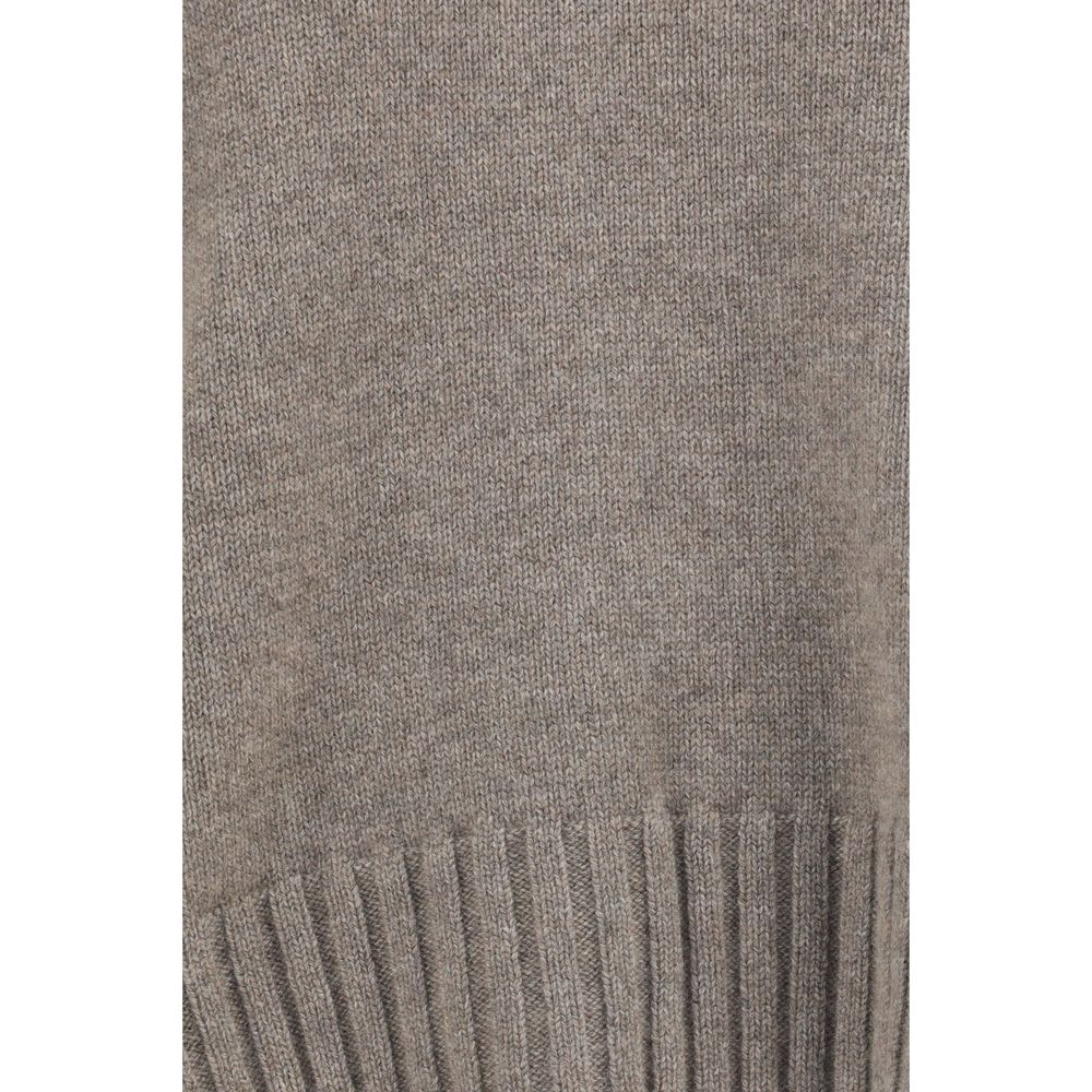 Indulge in the Malo Beige Cashmere Sweater, a masterpiece of Italian craftsmanship in 100% premium cashmere, embodying timeless elegance and luxurious comfort for every occasion.