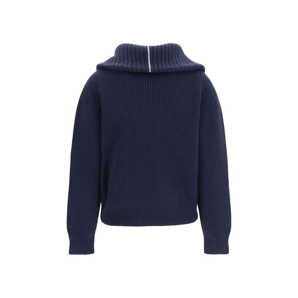 Discover the Malo Blue Cashmere Polo Shirt, a luxurious blend of 100% cashmere, enveloping you in warmth and elegance for every occasion.