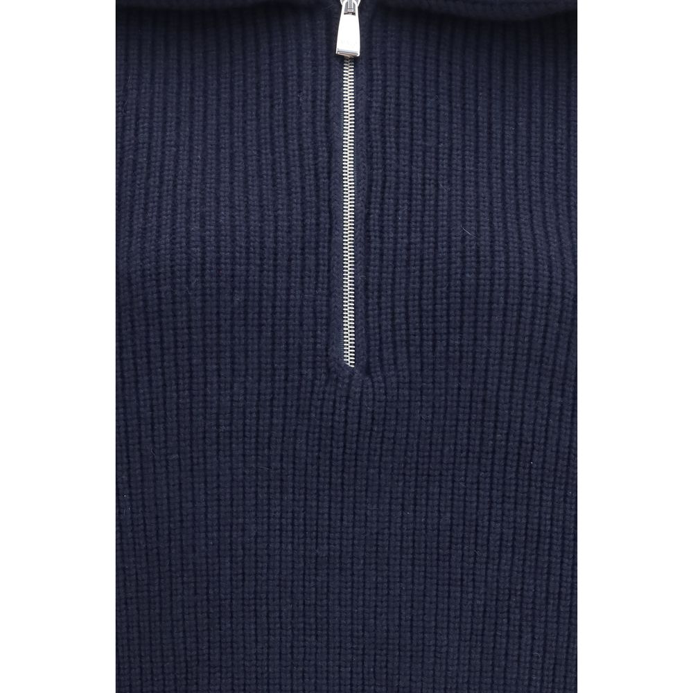 Indulge in the Malo Blue Cashmere Polo Shirt, a luxurious blend of 100% cashmere, offering an enveloping silhouette that exudes sophistication and warmth for every occasion.