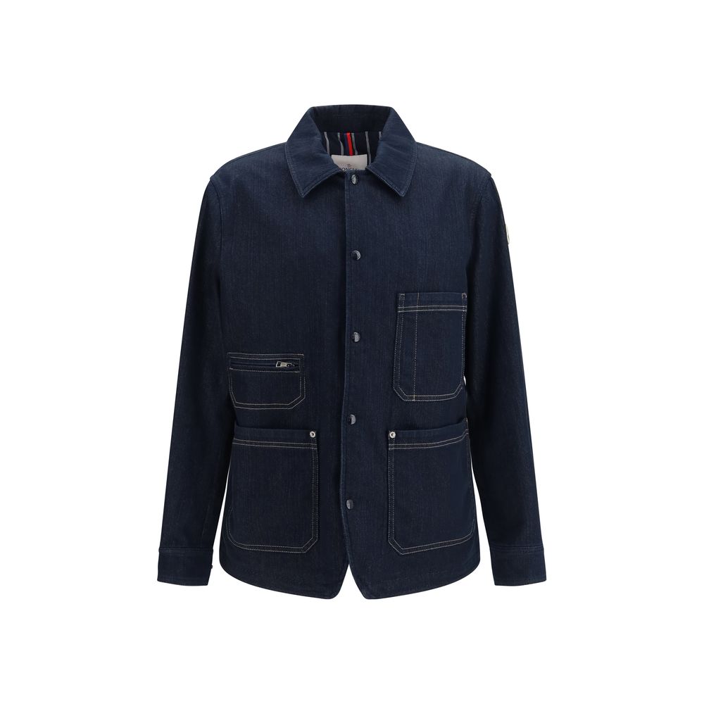 Discover the Moncler Blue Cotton Denim Jacket, a luxurious blend of craftsmanship and style, perfect for those who embrace elegance and sophistication in every occasion.
