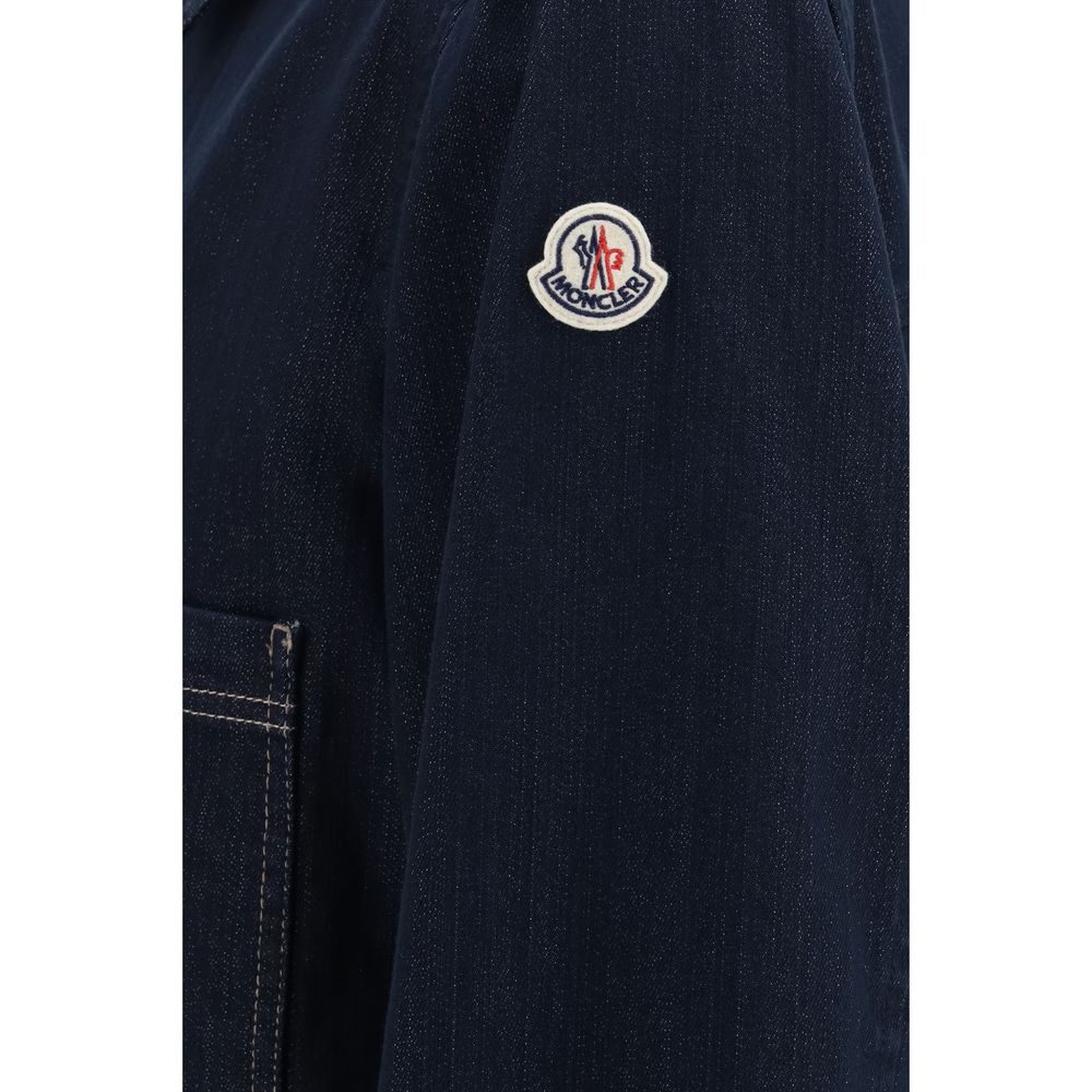 Discover the Moncler Blue Cotton Denim Jacket, a luxurious blend of washed denim and refined craftsmanship, perfect for those who embody elegance and sophistication.