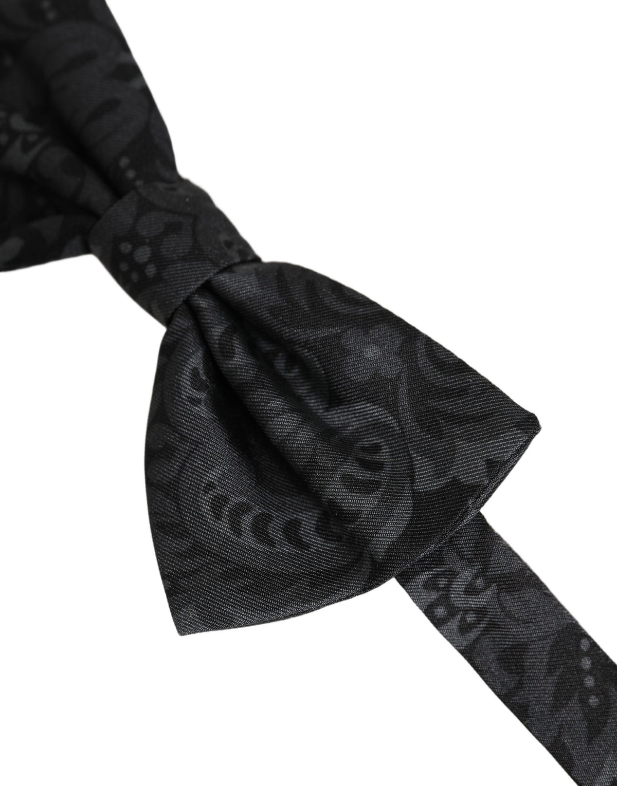 Indulge in the exquisite allure of the Dolce & Gabbana Black Paisley Silk Bow Tie, a symbol of Italian craftsmanship and timeless elegance for the discerning individual.