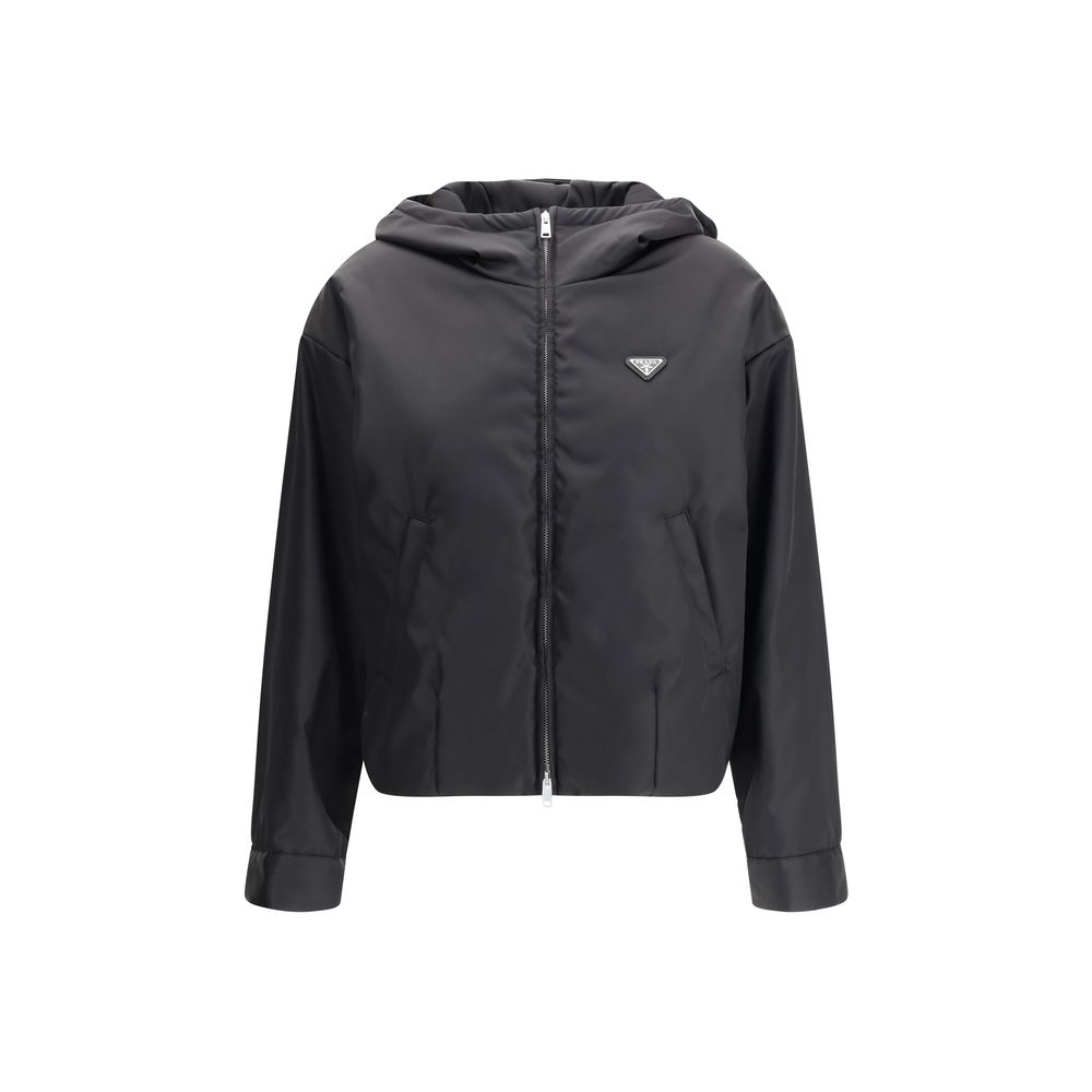 Discover the Prada Black Recycled Polyamide Shell Jacket, a fusion of sustainable luxury and modern elegance, crafted for the discerning individual who values sophistication.