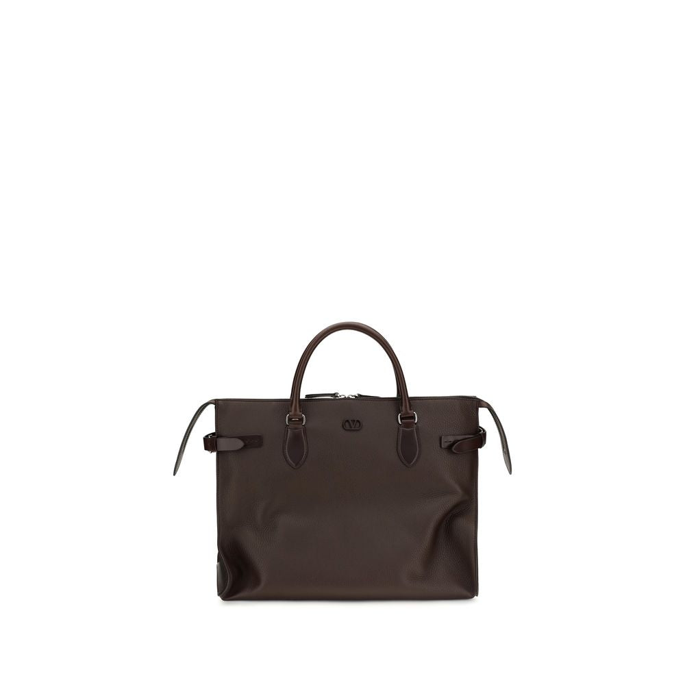 Indulge in the exquisite Valentino Garavani Brown Calf Leather Bos Taurus Shoulder Bag, a masterpiece of Italian craftsmanship that embodies elegance and versatility for the discerning individual.