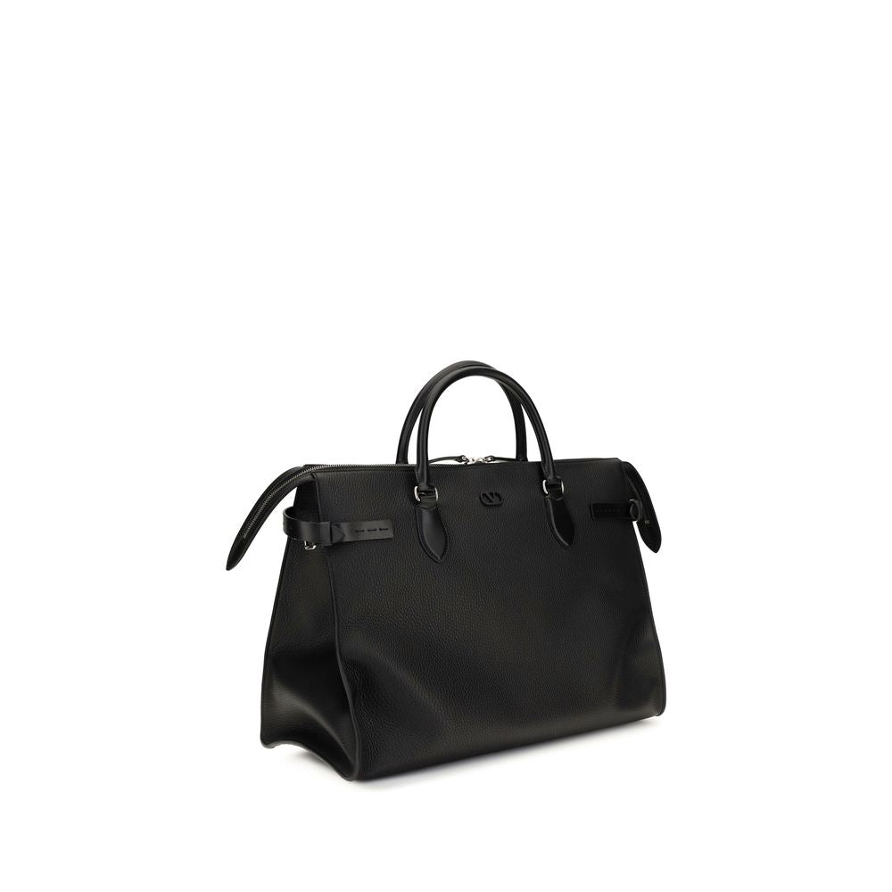 Discover the Valentino Garavani Black Calf Leather Bos Taurus Shoulder Bag, a masterpiece of Italian craftsmanship that exudes elegance and versatility for the discerning individual.