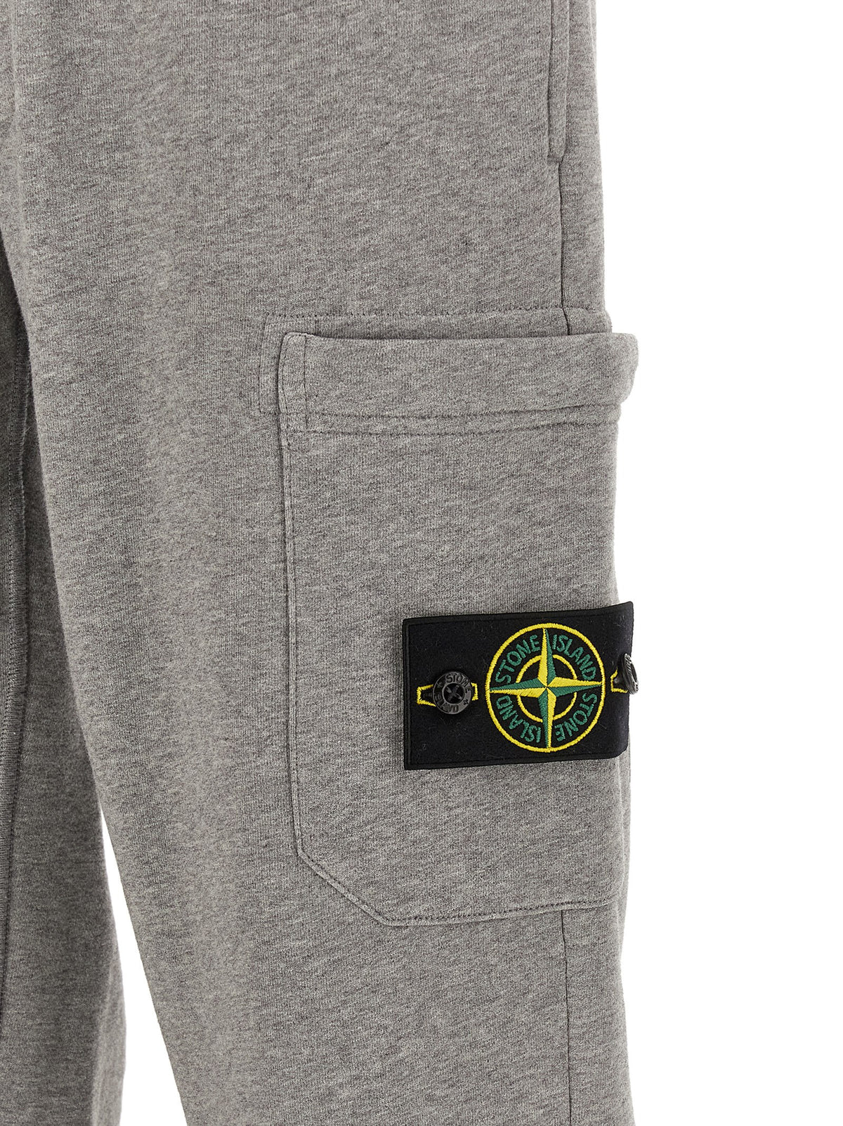 Elevate your wardrobe with Stone Island Gray Cotton Joggers, where luxury meets urban sophistication, crafted from premium cotton for timeless elegance and unmatched comfort.