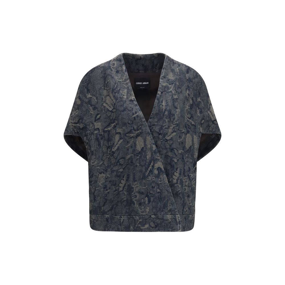 Discover the Giorgio Armani Blue Cotton Denim Jacket, a masterpiece of floral jacquard craftsmanship, embodying elegance and sophistication for the discerning individual.