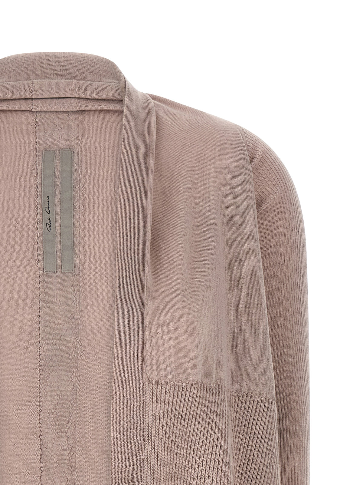 Discover the Rick Owens Multicolor Cotton Cardigan, a deconstructed masterpiece crafted in Italy from 100% cotton, embodying avant-garde luxury and effortless elegance.