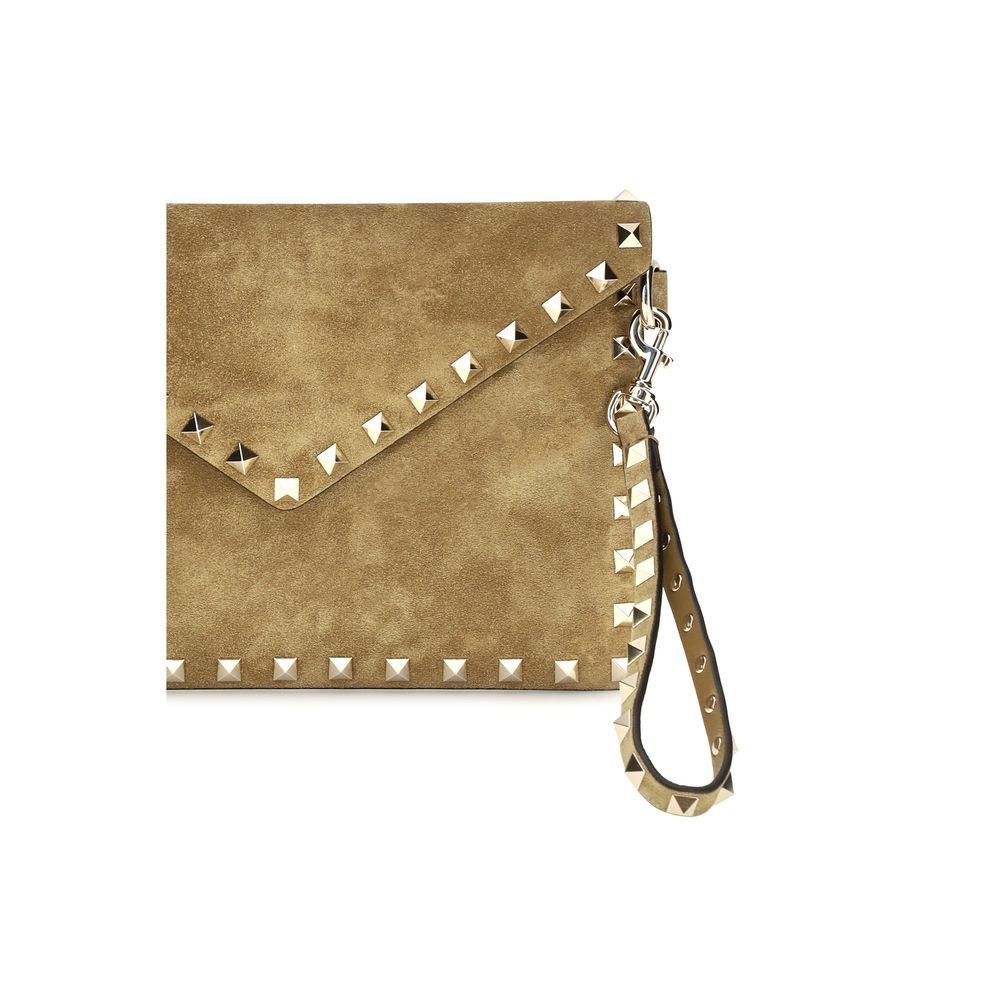 Indulge in the exquisite Valentino Garavani Beige Suede Leather Clutch Bag, a masterpiece of craftsmanship from the AW26 collection, embodying sophistication and timeless elegance.