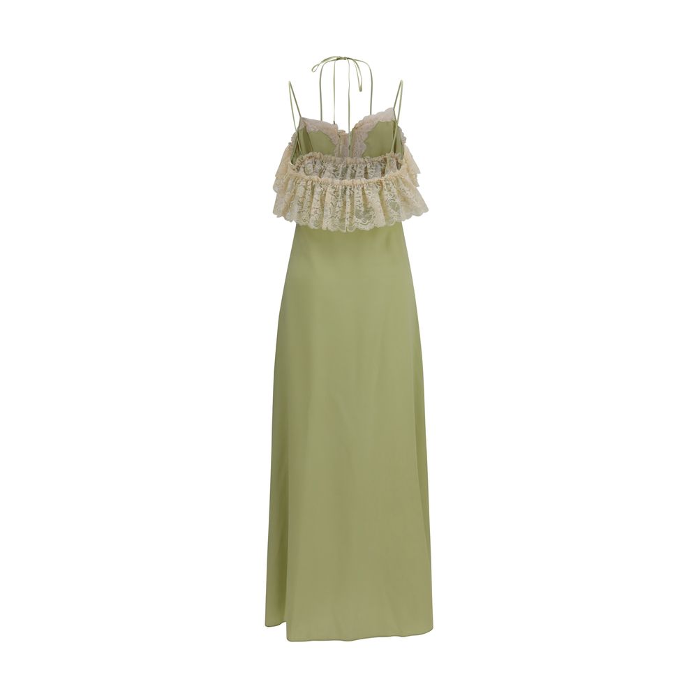 Discover the Chloé Bicolor Silk Casual Dress, a masterpiece of 100% silk from the AW26 collection, embodying timeless elegance and effortless luxury for the discerning individual.