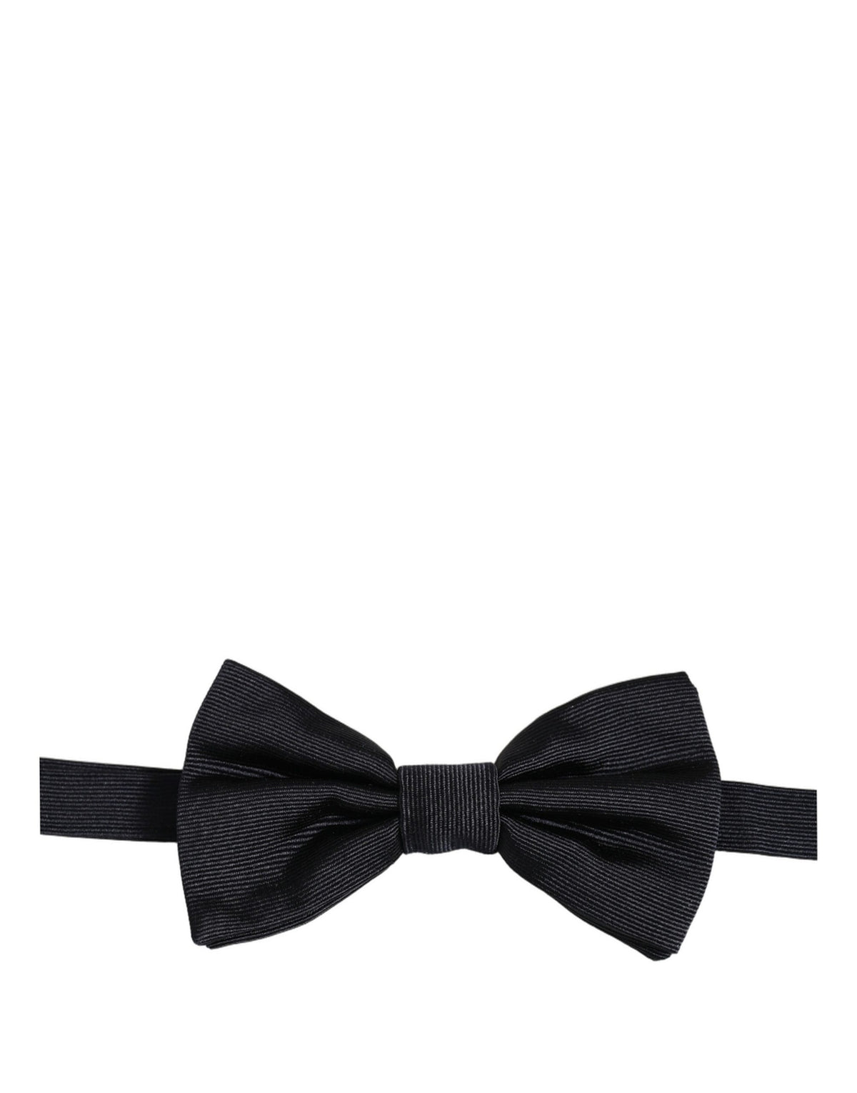 Elevate your elegance with the Dolce & Gabbana black silk bow tie, a luxurious accessory crafted in Italy, perfect for the discerning individual seeking timeless sophistication.
