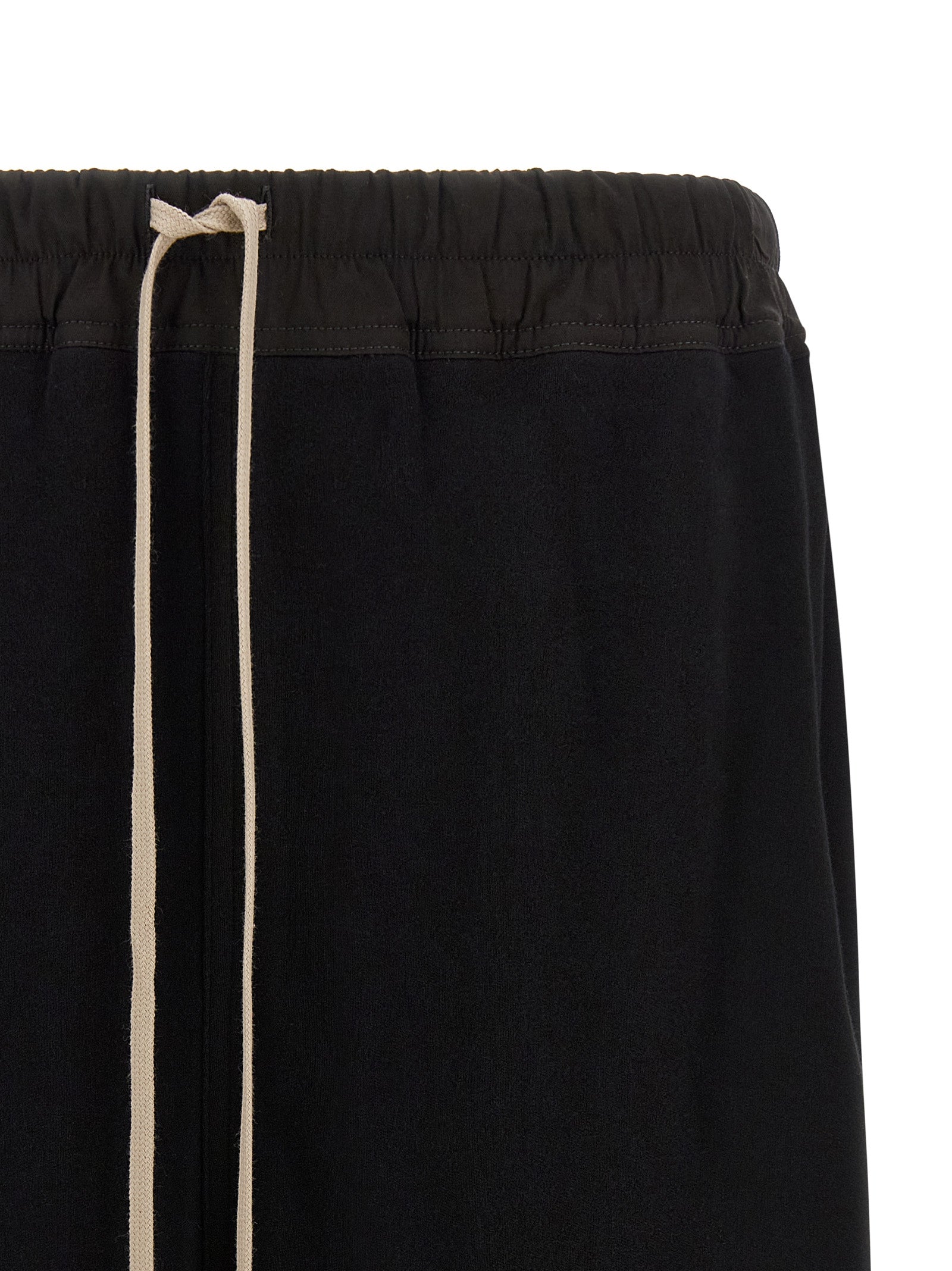 Discover the allure of Rick Owens' Black Cotton Bermuda Shorts, where avant-garde design meets luxurious comfort, crafted for those who embody sophistication and style.