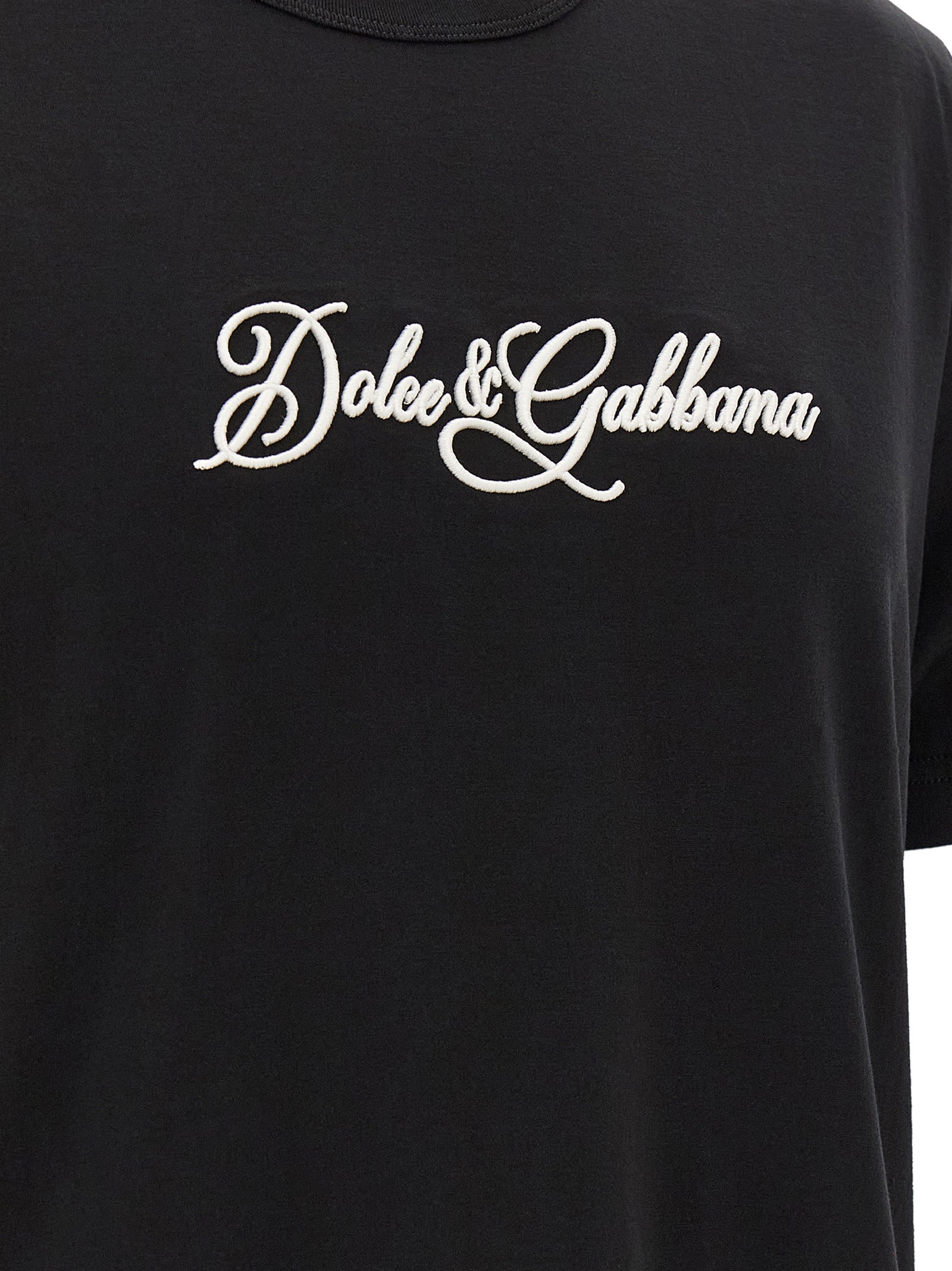 Elevate your wardrobe with the Dolce & Gabbana Black Cotton T-Shirt, where exquisite craftsmanship meets modern sophistication, perfect for the discerning individual.