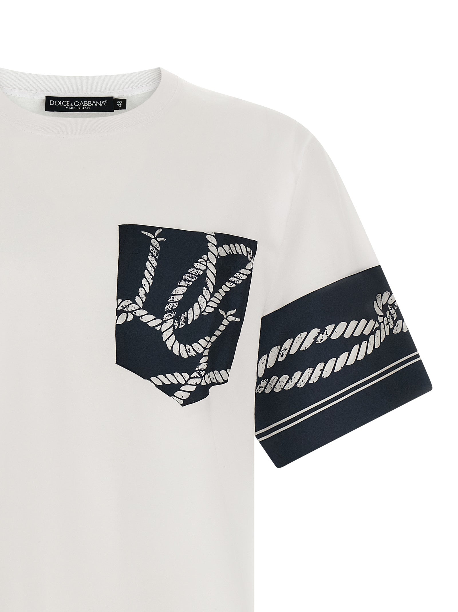 Elevate your wardrobe with the Dolce & Gabbana Blue Cotton T-Shirt, featuring exquisite silk inserts and nautical motifs, a testament to Italian craftsmanship and luxury.