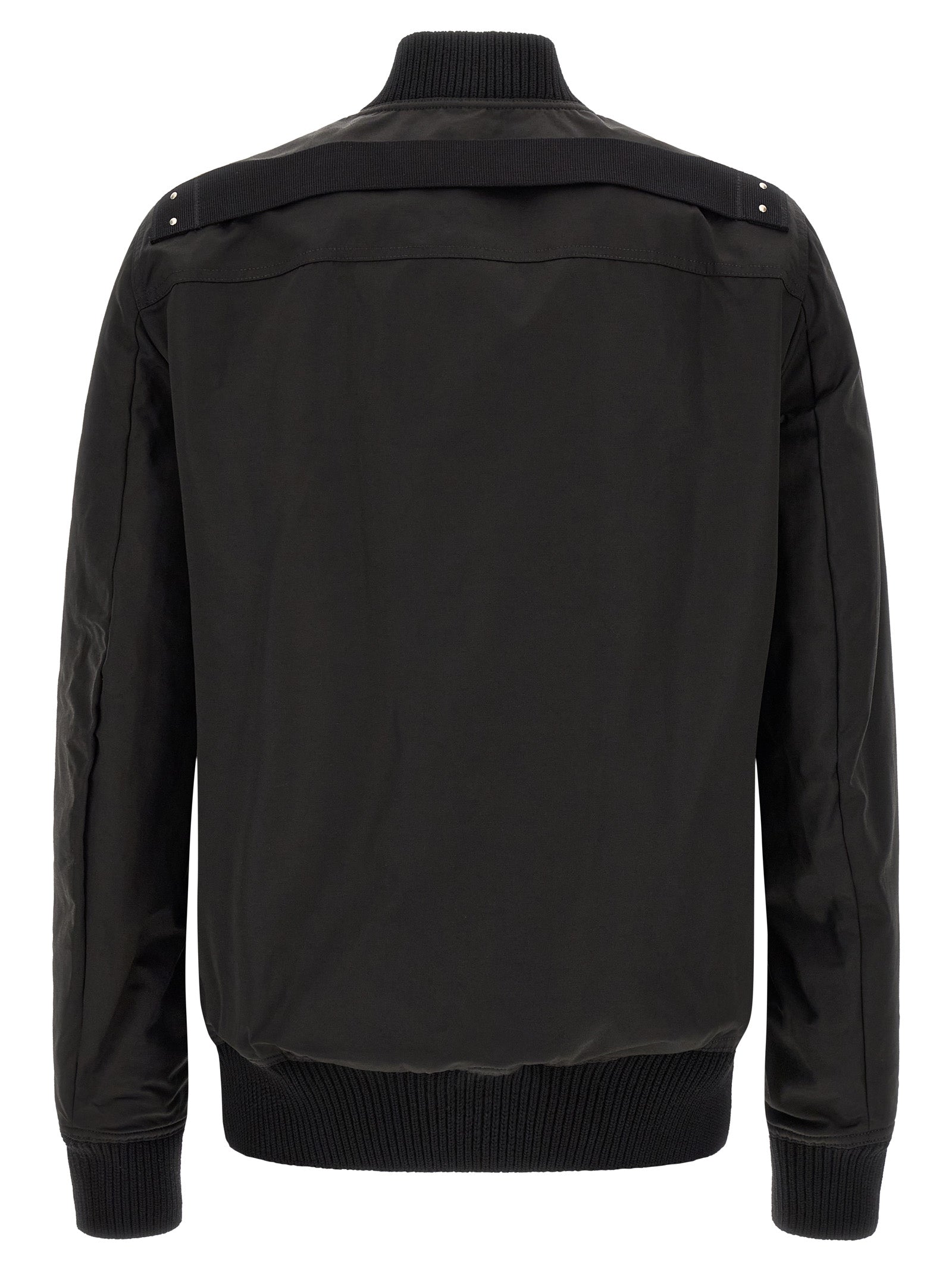 Experience the allure of the Rick Owens Black Nylon Bomber, a masterful blend of avant-garde design and Italian craftsmanship, elevating your wardrobe with its luxurious silhouette.