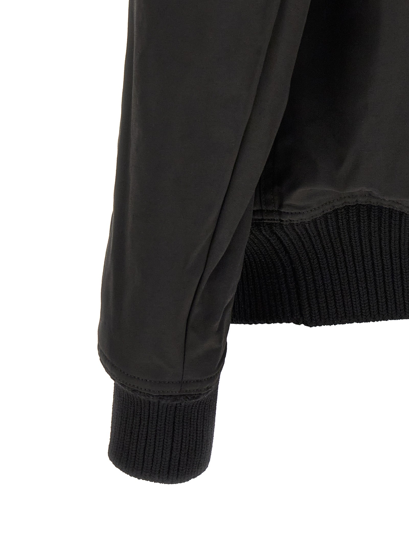 Elevate your style with the Rick Owens Black Nylon Bomber, a masterpiece of Italian craftsmanship that redefines luxury outerwear for the discerning individual.