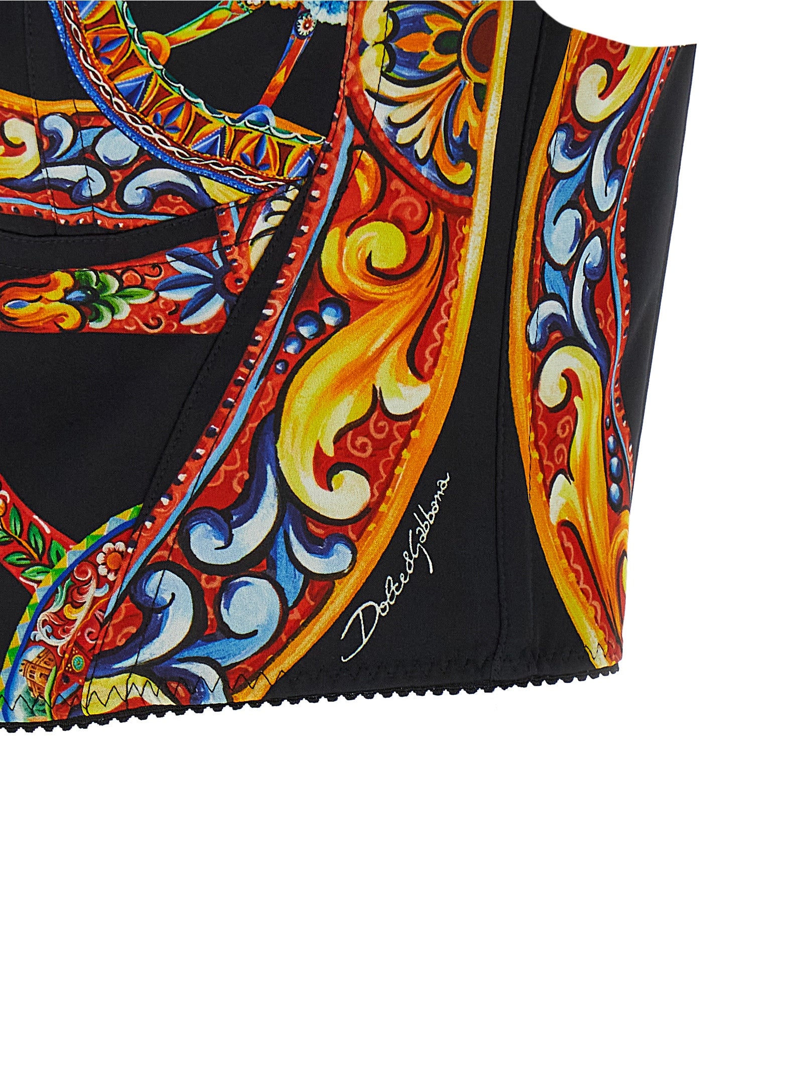 Indulge in the exquisite Dolce & Gabbana Multicolor Silk Tank Top, a masterpiece of Italian craftsmanship featuring the iconic Sicilian ‘Carretto’ print for an unparalleled luxury experience.